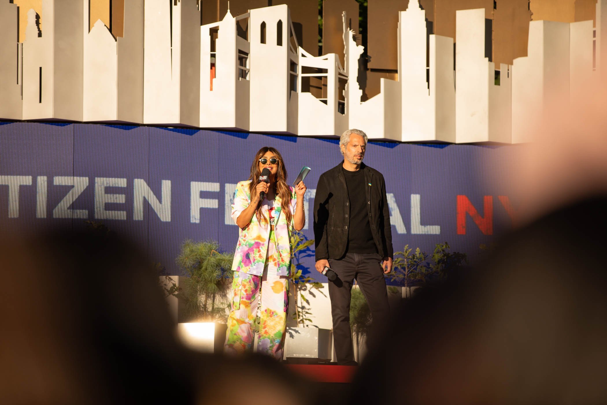Host Priyanka Chopra Jonas (left) and Guy Oseary of Maverick and Sound Ventures speak at Global Citizen Festival: NYC in Central Park on Saturday, Sept. 24, 2022.