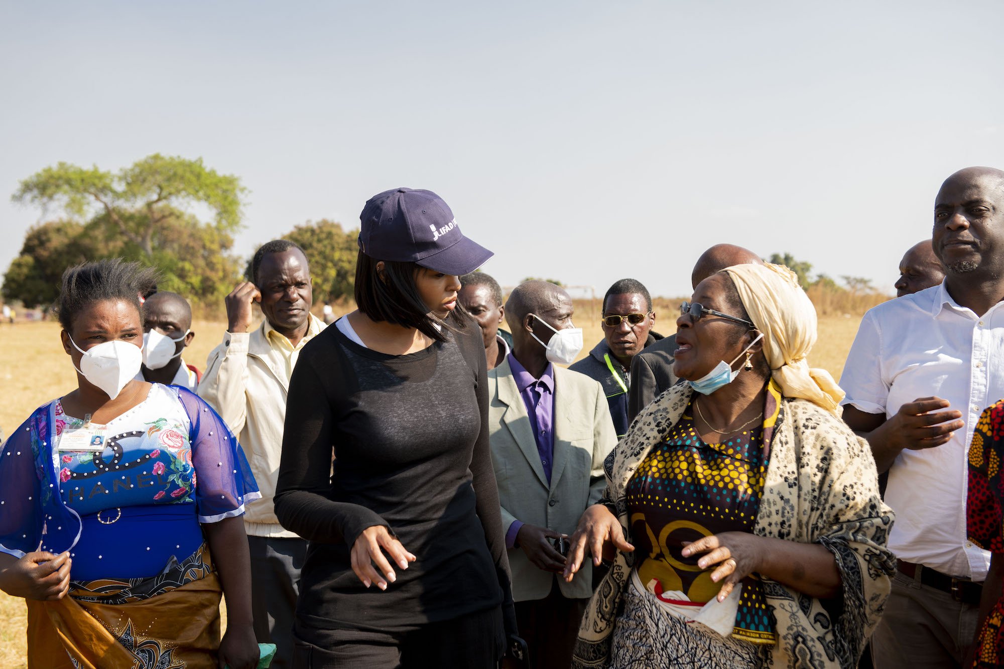 IFAD Goodwill Ambassador, Sabrina Dhowre Elba speaks to community members in Zambia.
