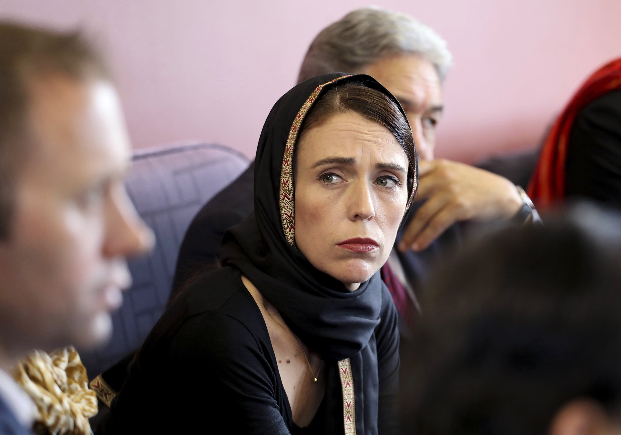 In this photo released by New Zealand Prime Minister's Office, Prime Minister Jacinda Ardern, center, meets representatives of the Muslim community, March 16, 2019, at the Canterbury Refugee Centre in Christchurch, New Zealand.