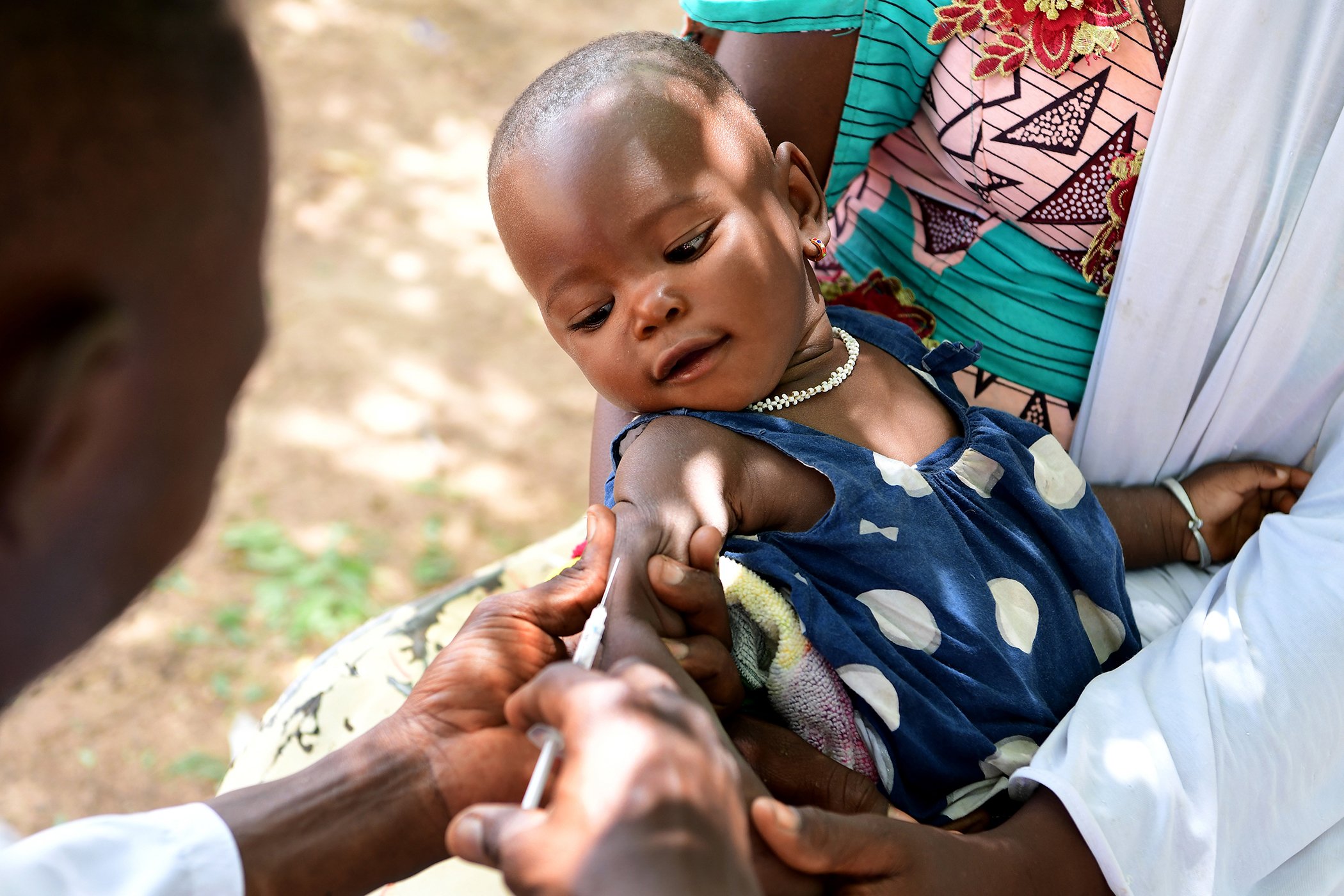 A baby is vaccinated in Boulpore, the central plateau region of Burkina Faso on July 1, 2021.