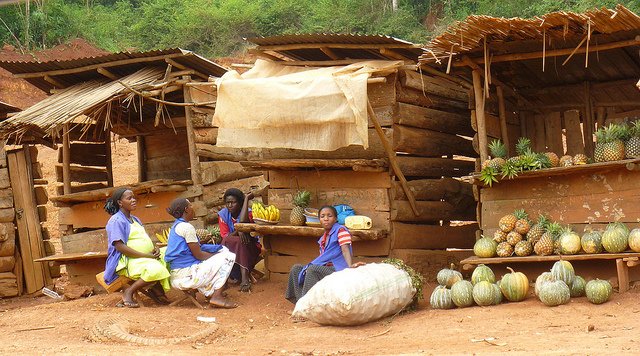 A group of women in Uganda with fresh produce.