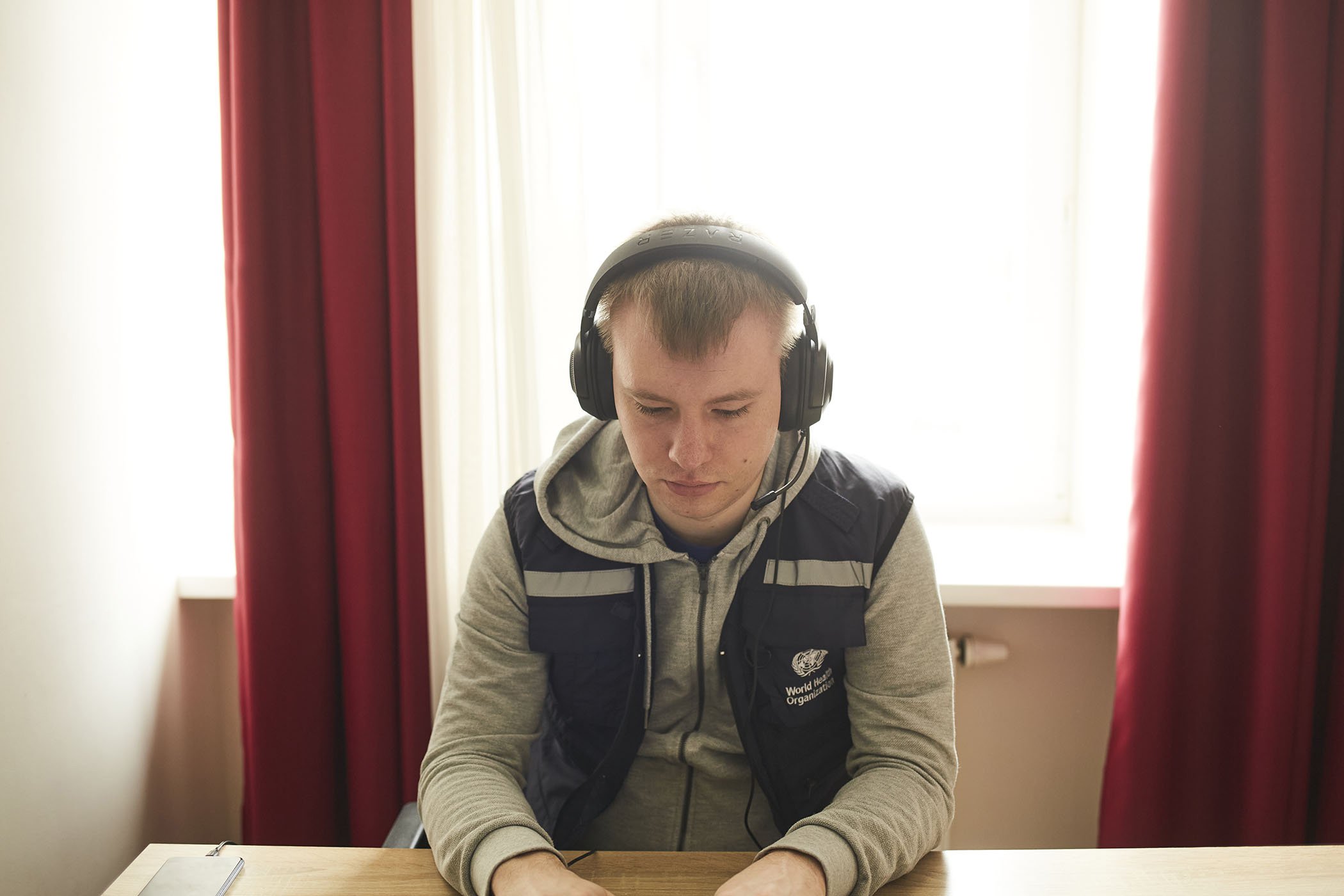 Currently based out of a hotel in Truskavets, Yevgenii Grechukha works on his computer, communicating with teams across the country who have limited access to the internet and phone lines.