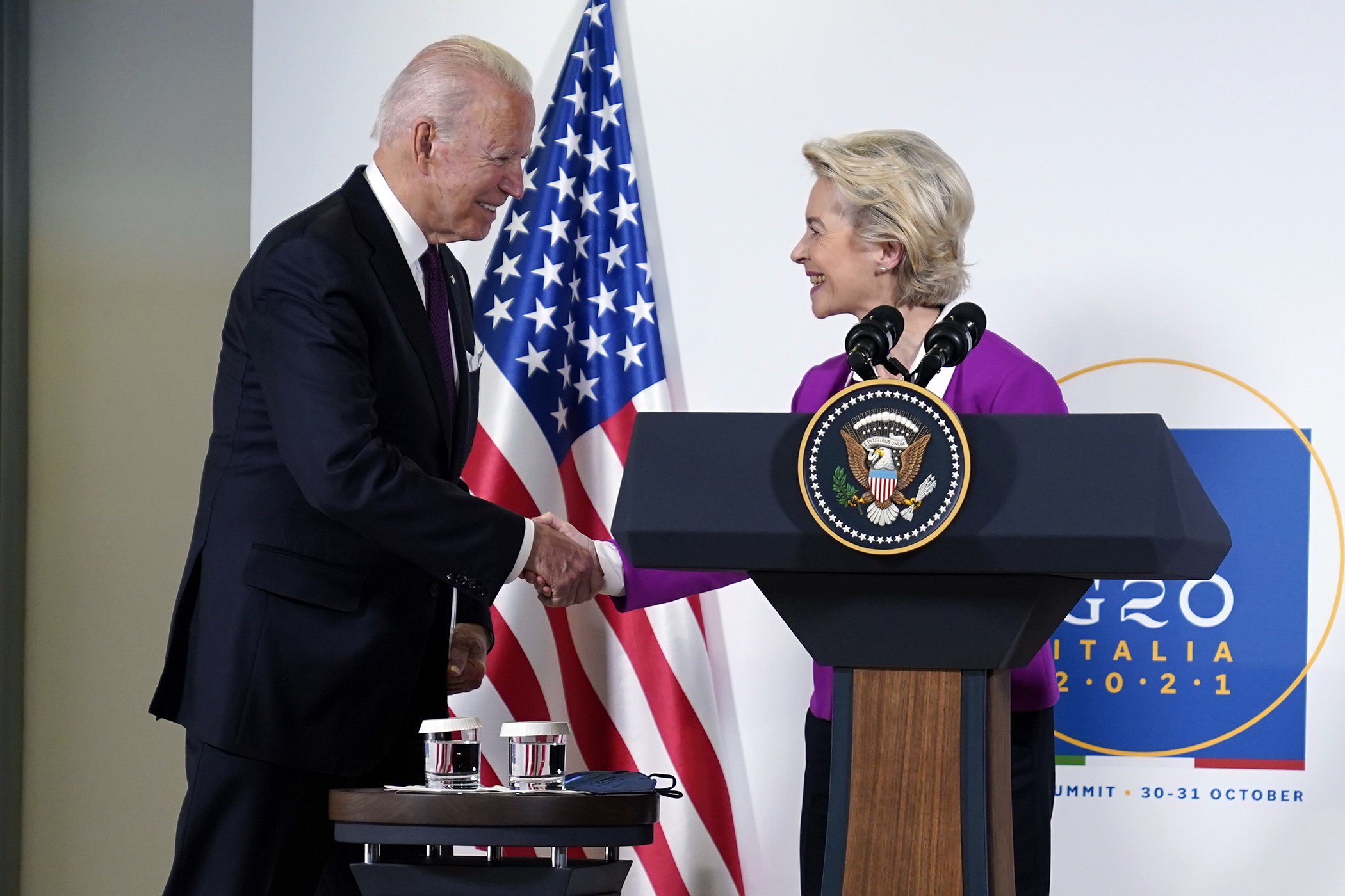 President Joe Biden and European Commission president Ursula von der Leyen shake hands after talking to reporters during the G20 leaders summit, Sunday, Oct. 31, 2021, in Rome.