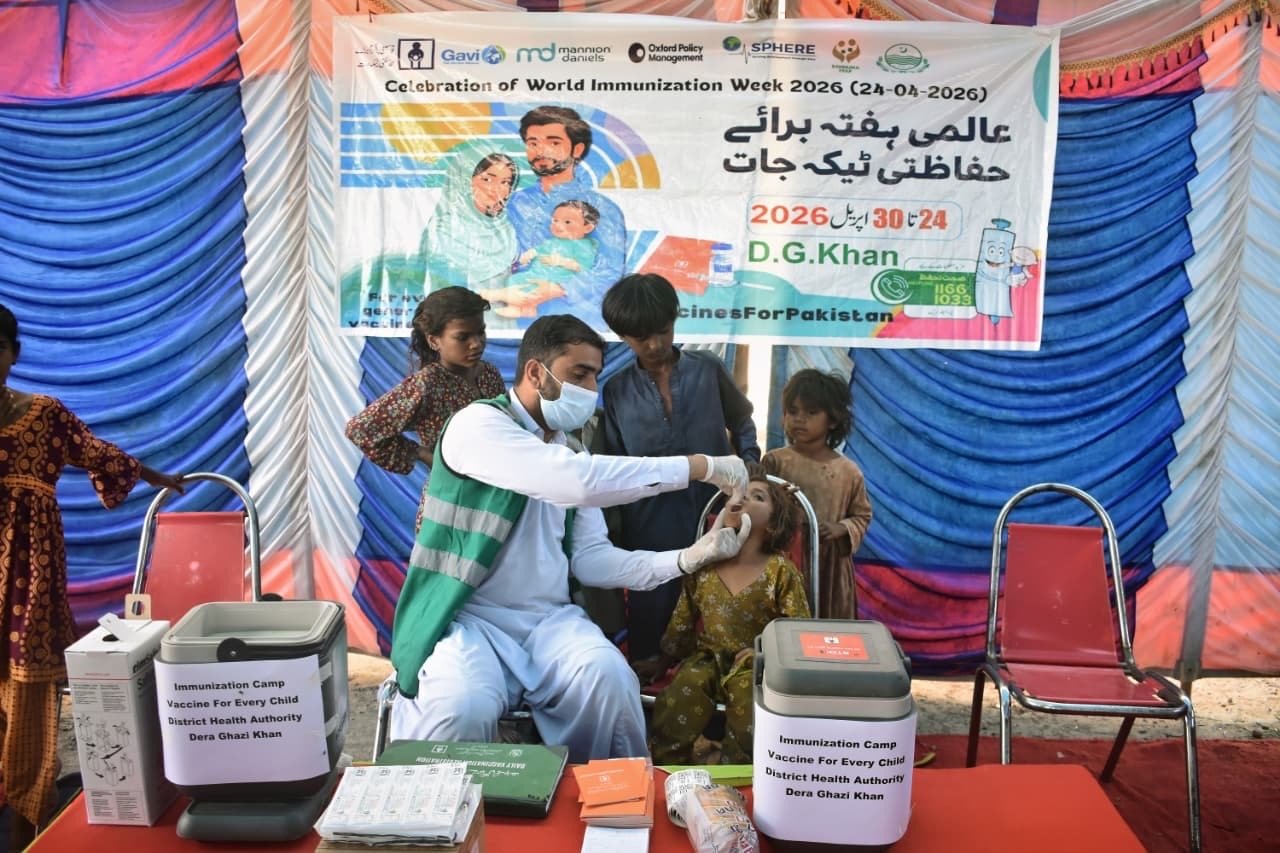 A child receives a vaccine during a community outreach campaign, part of efforts to expand immunization access.
