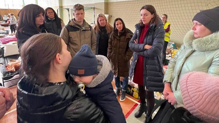 Michael Sheldrick, Global Citizen, and UNHCR visit the Poland-Ukraine border and speak directly with refugees about their experiences in March 2022.