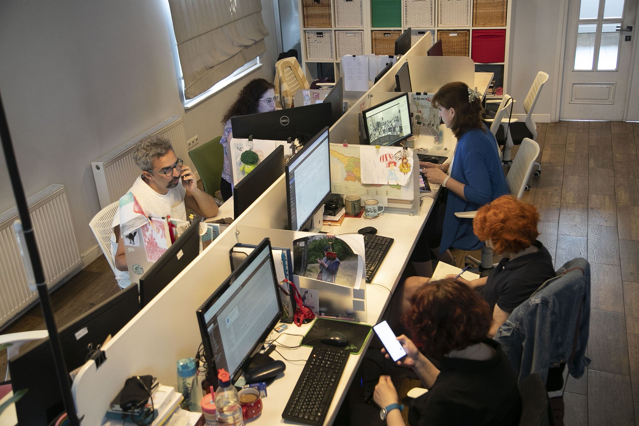 Team members at work at the office of Batumelebi on  July 12, 2024, Tbilisi, Georgia. The publication's priority is to cover issues related to human rights, vulnerable and marginalized groups, and minorities.