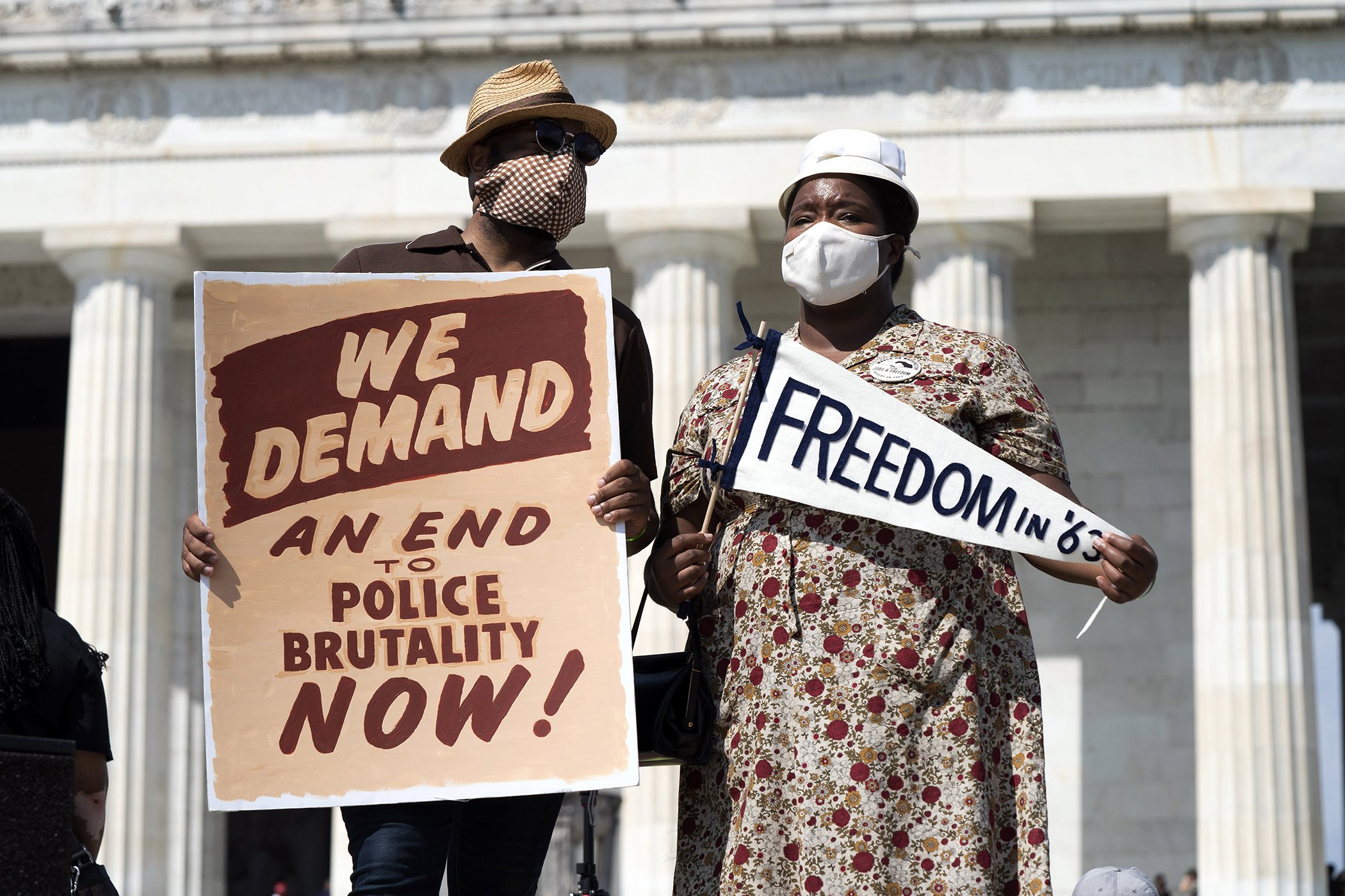 Marvin Alonzo Greer and Cheyney Mcnight gather at Lincoln Memorial to attend the March on Washington, DC Aug. 28, 2020, on the 57th anniversary of the Rev. Martin Luther King Jr.'s "I Have A Dream" speech.