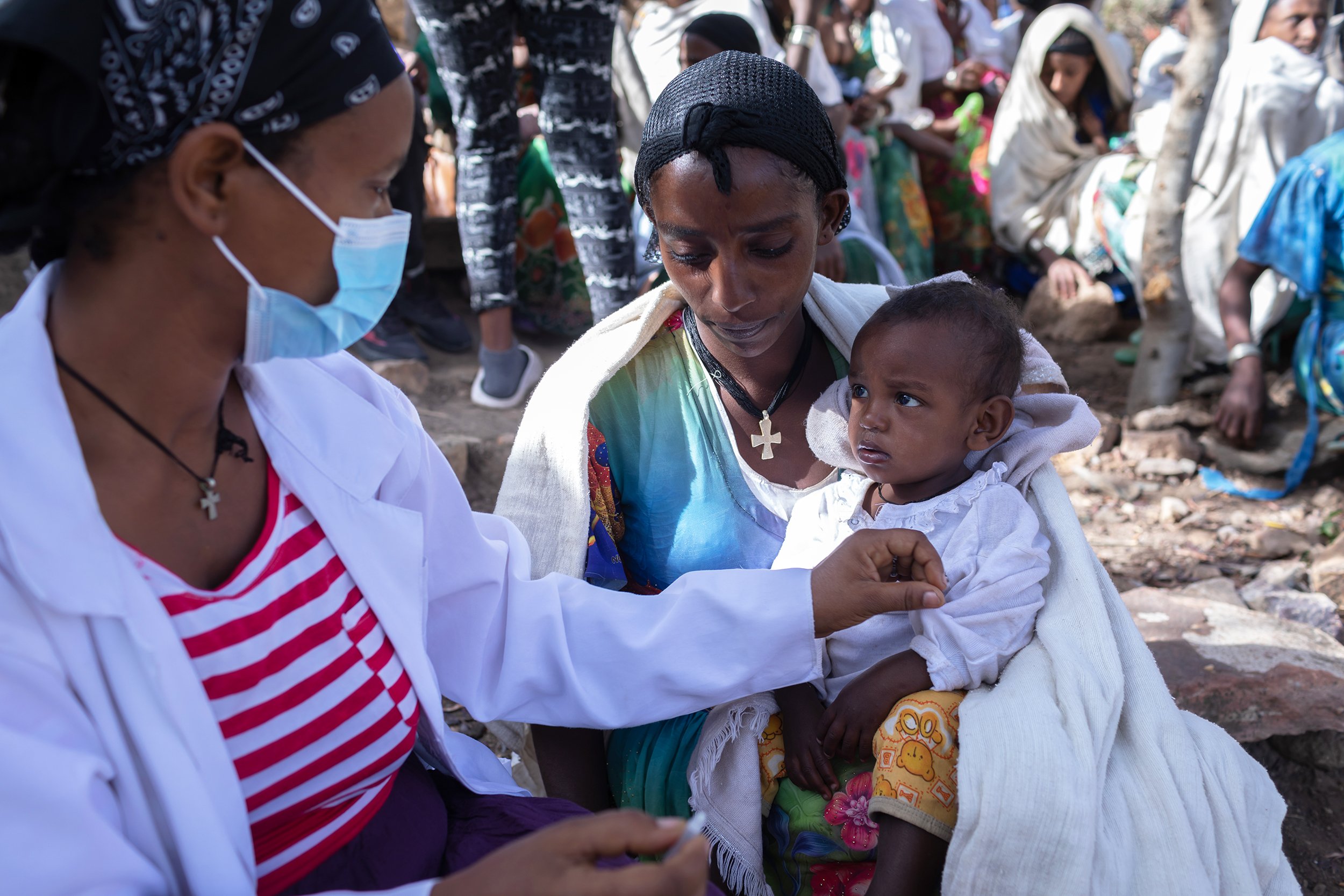 One-year-old Mahlet Geta gets her vaccination in Aba Yohannes village. At the UNICEF-supported vaccination campaign in the Waghimra zone of the Amhara region in May 2022, children and pregnant women were also screened for their nutrition status.