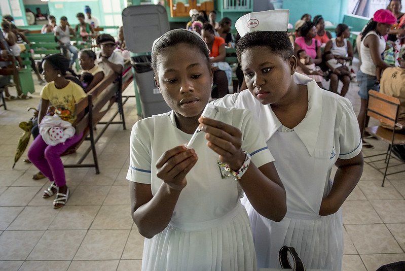 Haiti Ward Nurses At a maternal and child clinic at La Fossette Health Center in Haiti, patients arrive for regular check-ups as well as vaccinations. Photo by Karen Kasmauski, MCSP and Jhpiego