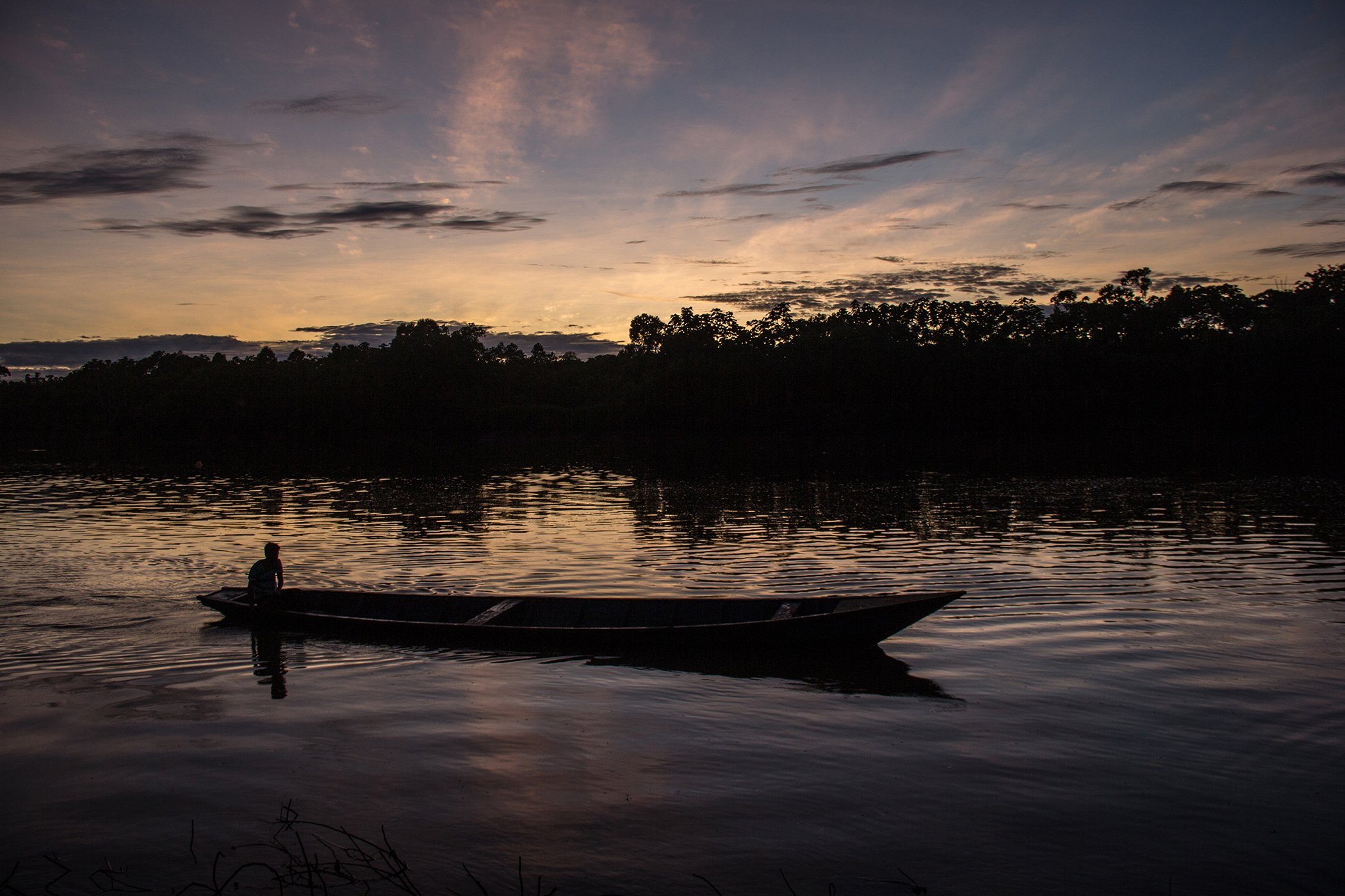 A fisherman is pictured on the Ucayali river in Peru, frequently used by the indigenous communities in the area. The Ucayali River is the main headwater tributary of the Amazon River.