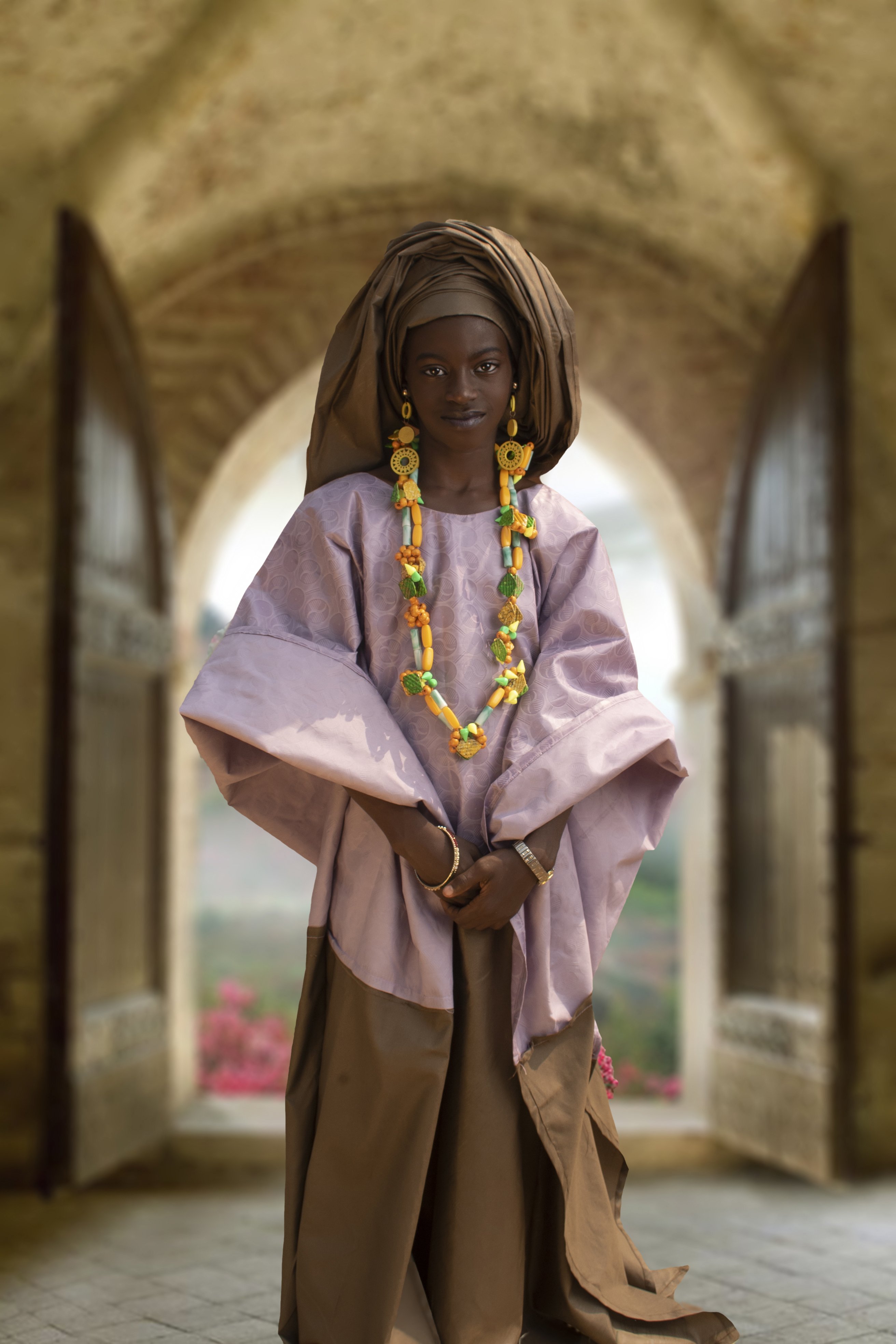 A Dreamcatchers Academy student in a recreation of a portrait of Oumou Sy, Senegalese fashion designer popularly known as "Senegal's Queen of Couture". Photo: DocumentWomen/Dreamcatchers Academy
