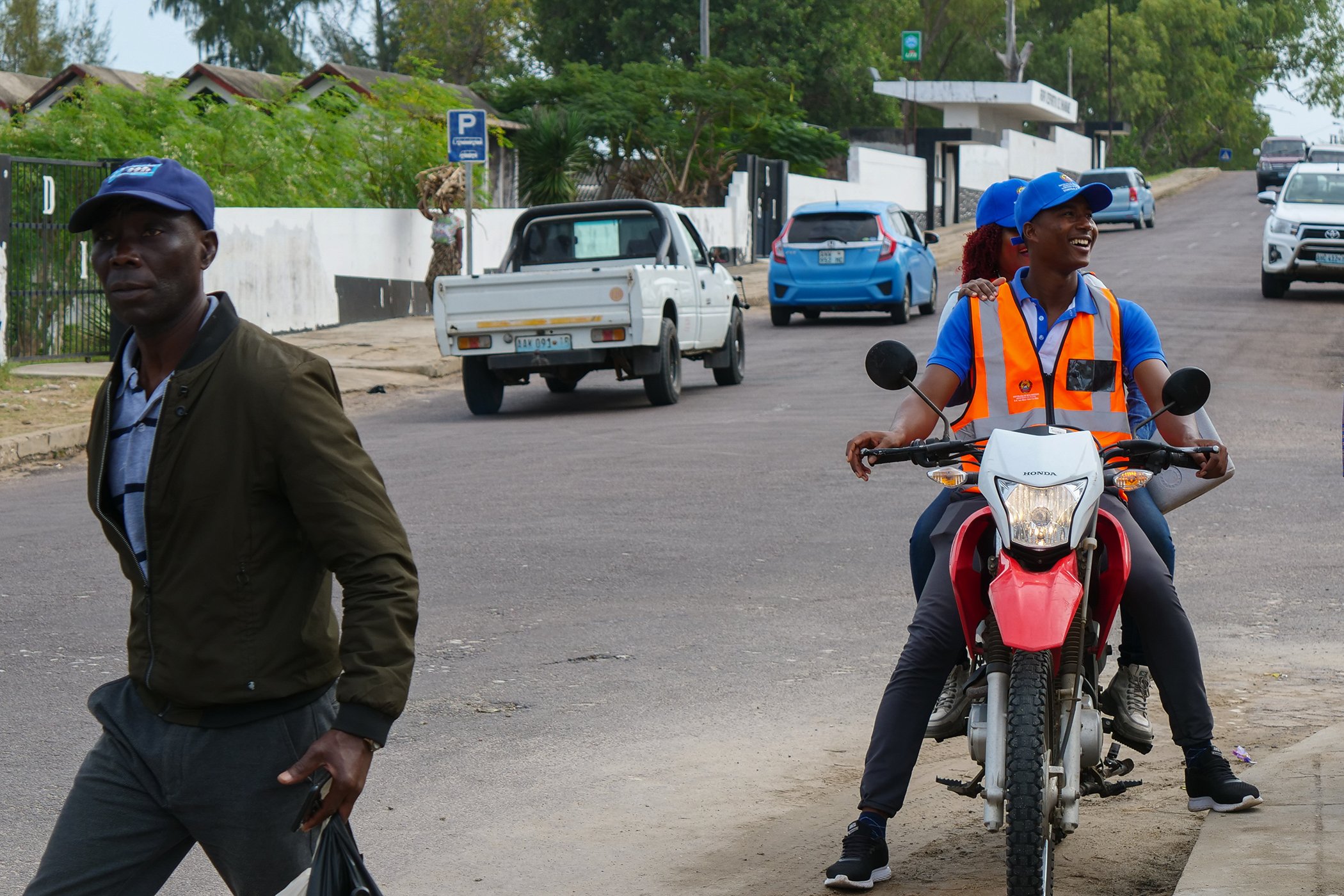 Polio workers on a motorbike in Inhambane, Mozambique, during a national campaign in June 2025. Motorbikes are used in social mobilisation in the lead to campaigns, as well as by vaccination teams in rural areas to raise awareness.