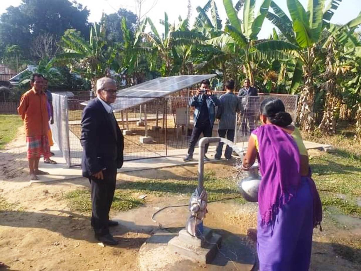 Santipada Gon Chaudhuri with villagers using a solar-powered water pump in Karbongbari village in Tripura, northeastern India, in 2018. Santipada Gon Chaudhuri with villagers using a solar-powered water pump in Karbongbari village in Tripura, northeastern India, in 2018.