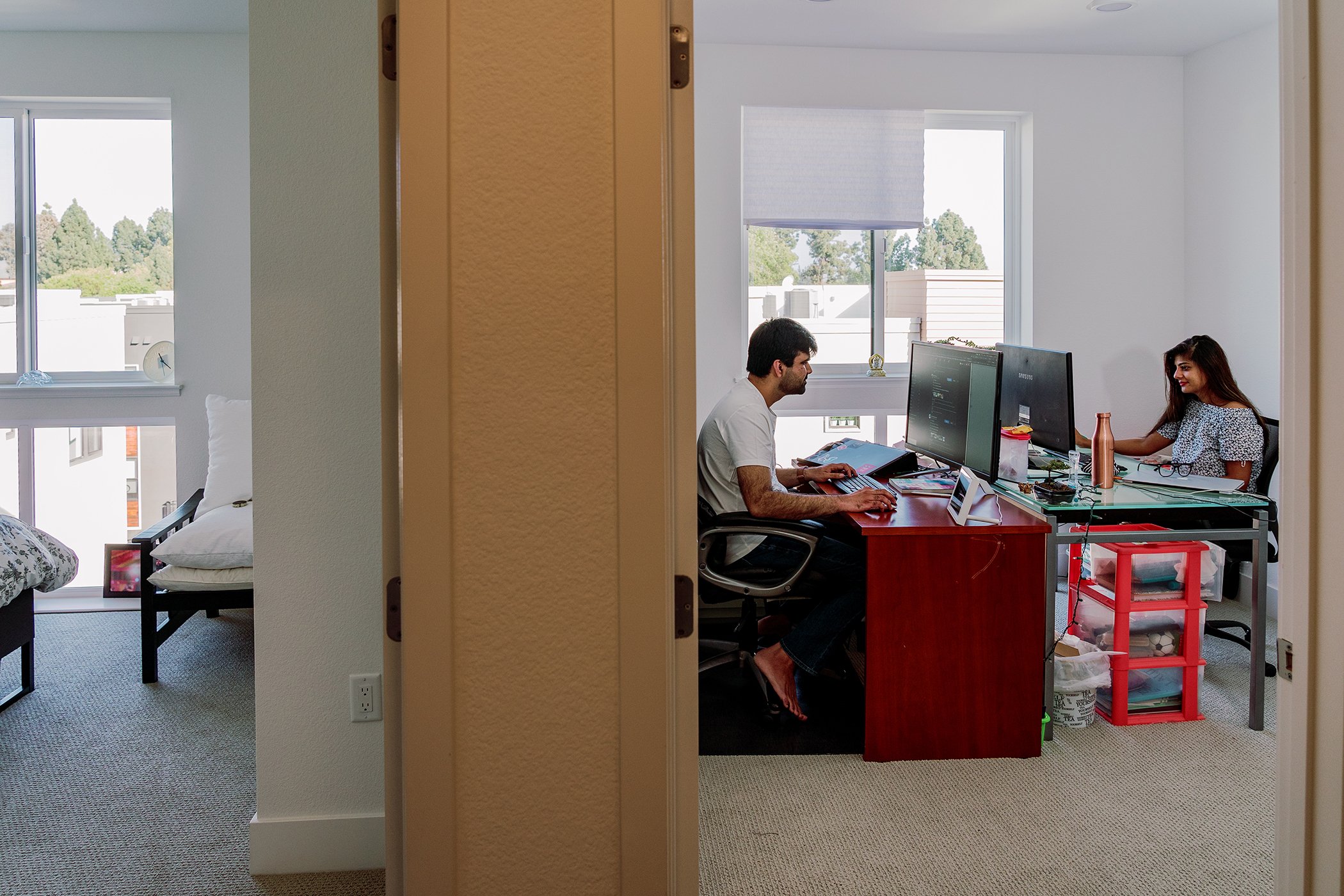Abhishek and Pooja Daryani, founders of Bay Area vaccine hunters, manage the Facebook group in their home office. Pooja, a UX designer, and Abhishek, a data engineer, created the platform in help provide the community information on the COVID-19 vaccine.
