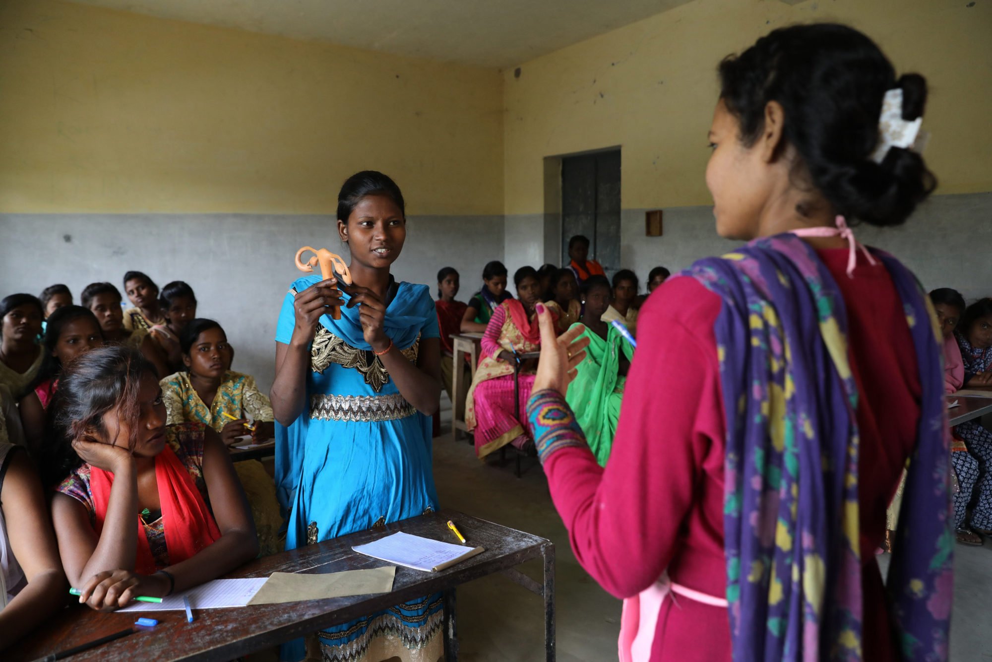 Teenagers from socially and economically marginalized communities attend a training about adolescent sexual and reproductive health in Raniganj, India. Girls in this age group have limited knowledge about menstruation and are shy to discuss the issue.