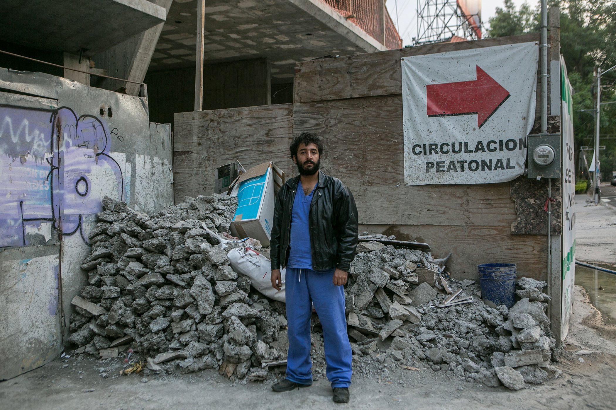 Franyuti stands at one of the collapsed buildings where Medical Impact worked recovery after the devastating earthquake in 2017. Forty-nine people died when the building collapsed. "This is the first time I've been back since 2017... I just have chills."