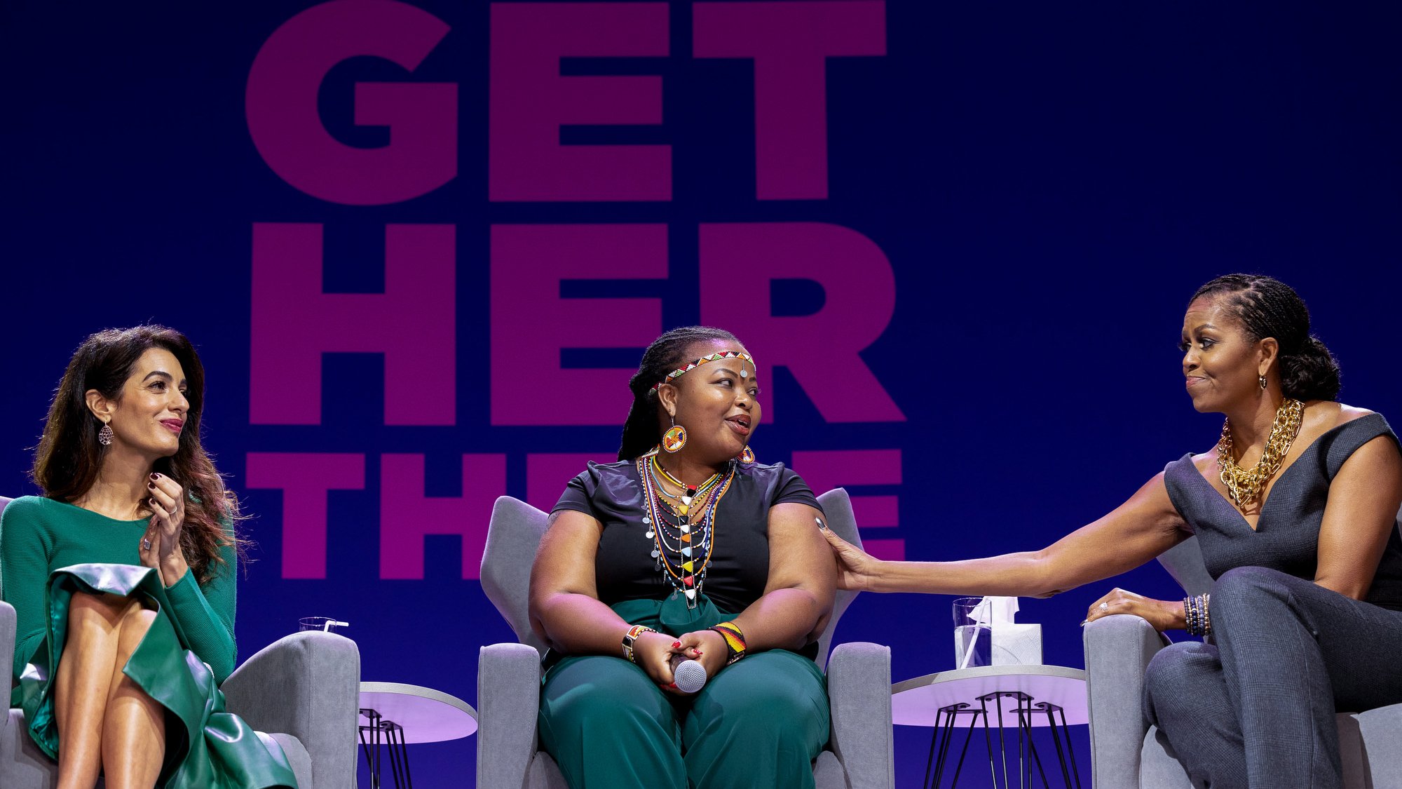 (L-R) Amal Clooney, Wanjiru Wahome, and Michelle Obama at the "Get Her There" event in New York City on Oct. 25, 2022.