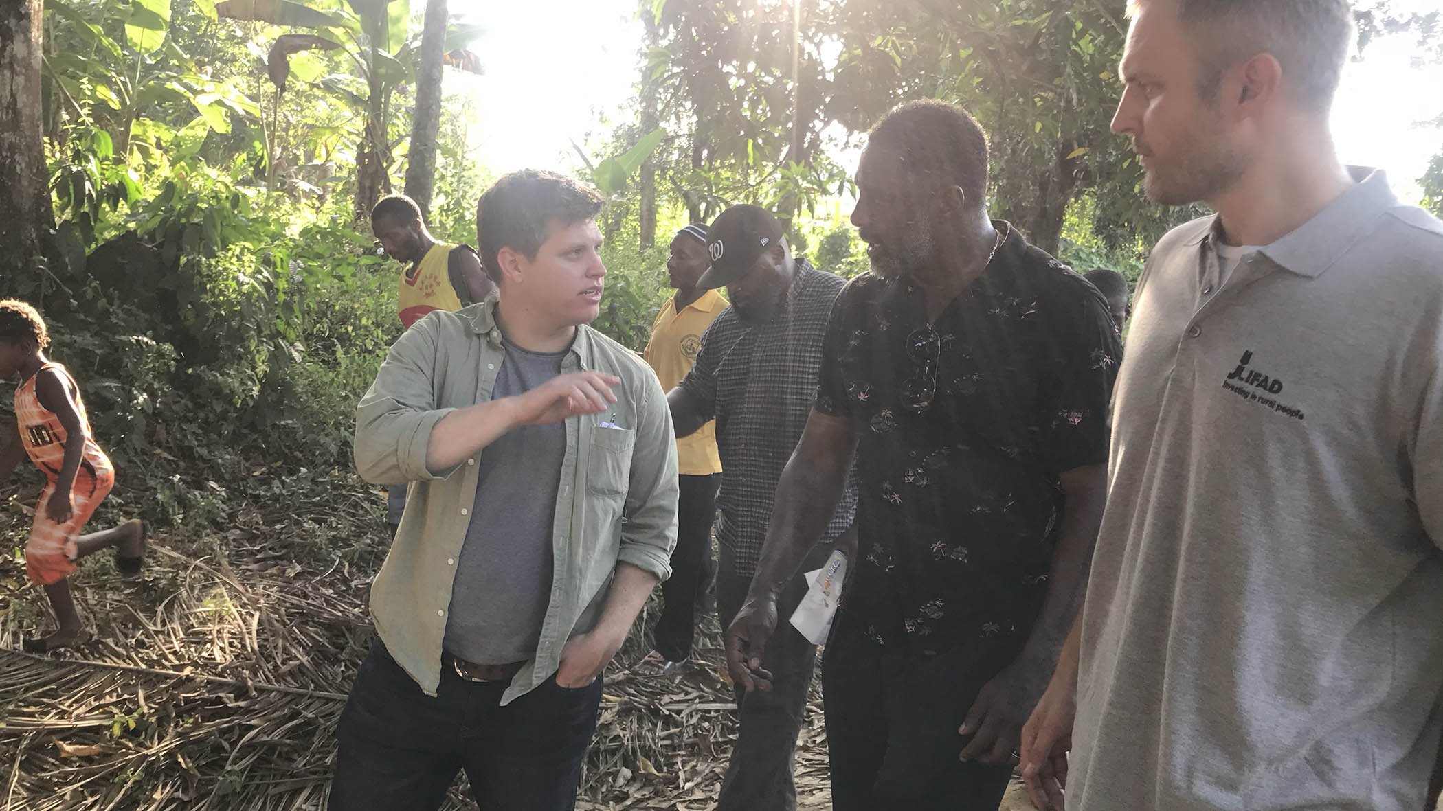 Michael Sheldrick (left) in Sierra Leone with Global Citizen Advocate Idris Elba and the International Fund for Agricultural Development (IFAD).