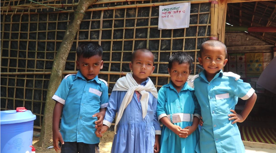 Nishu Moni and Amin, two five-year-old Rohingya students from the center, love school because in it they can learn while playing.