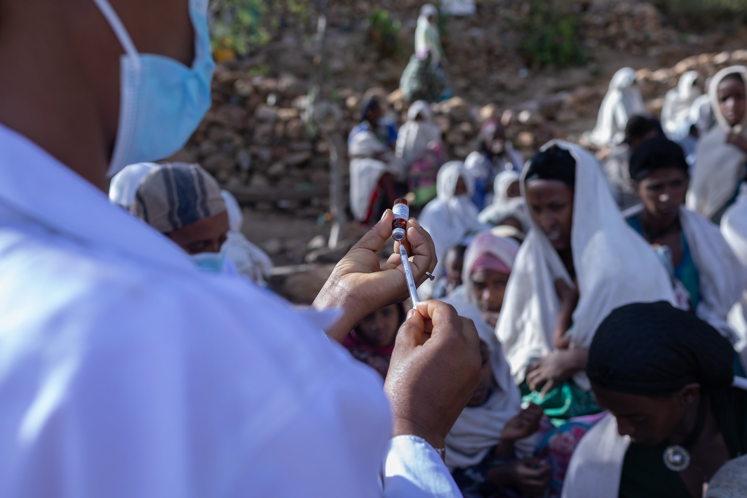 Misawey Abate prepares a vaccine in Aba Yohannes village. For months, health services were disrupted due to conflict.