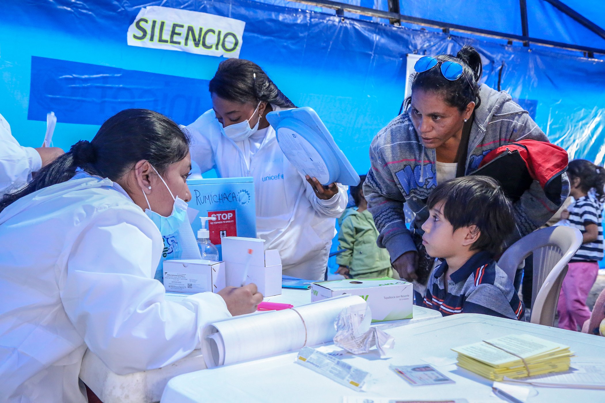 José David Dominguez, 9 years old, is accompanied by his mother, Yenni Dominguez, to get his vaccine at UNICEF's health point in Ipiales, Colombia, on Oct. 31, 2018. UNICEF has launched a regional response to support children and families from Venezuela,
