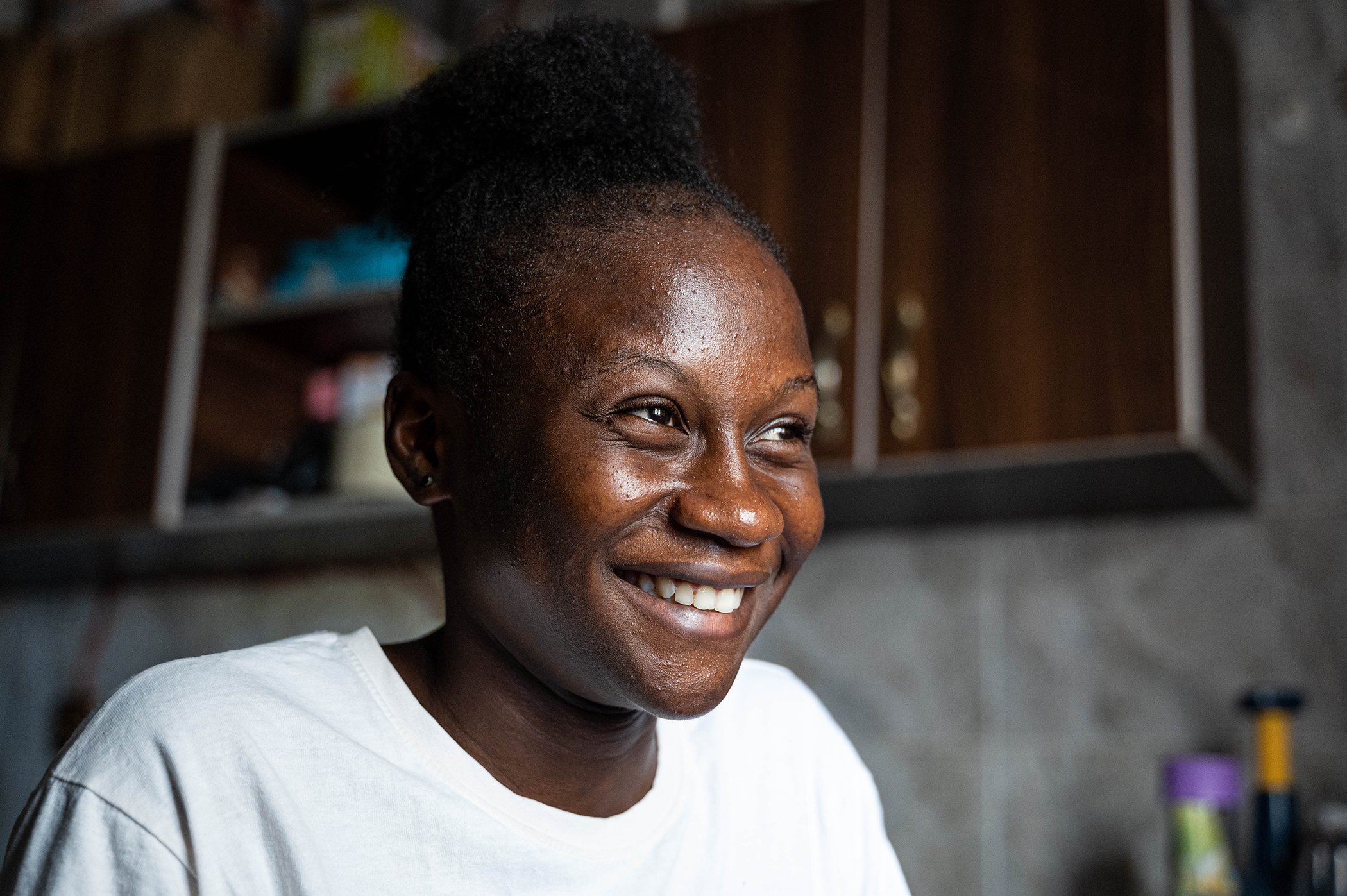 Sarah Solomon is photographed at her employer's home outside of Abuja, Nigeria in April 2023.