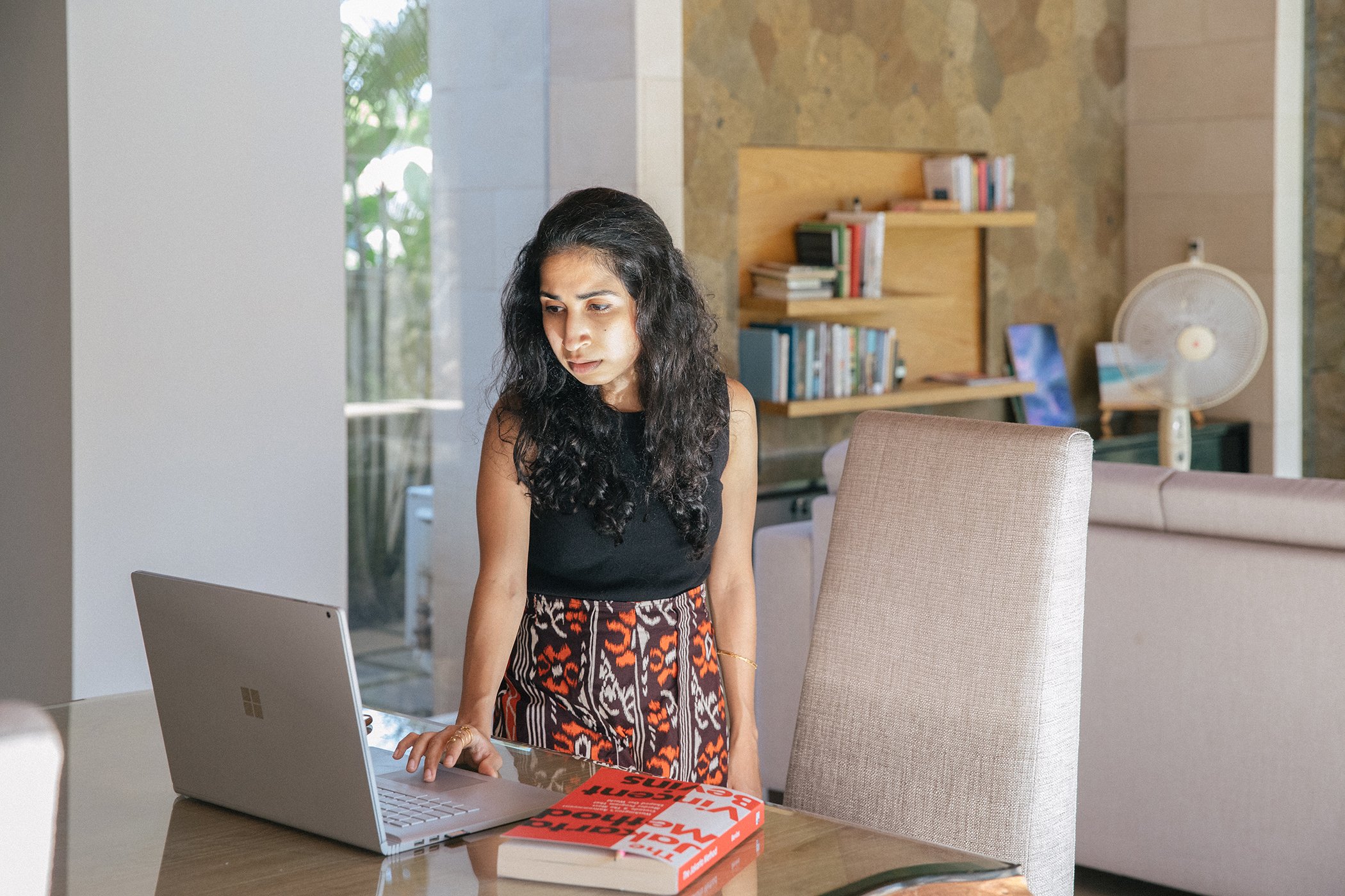 Nashin Mahtani works from her house in Bali, Indonesia in May 2022. She is the director of the nonprofit Yayasan Peta Bencana, where she leads the development of software to support disaster relief.