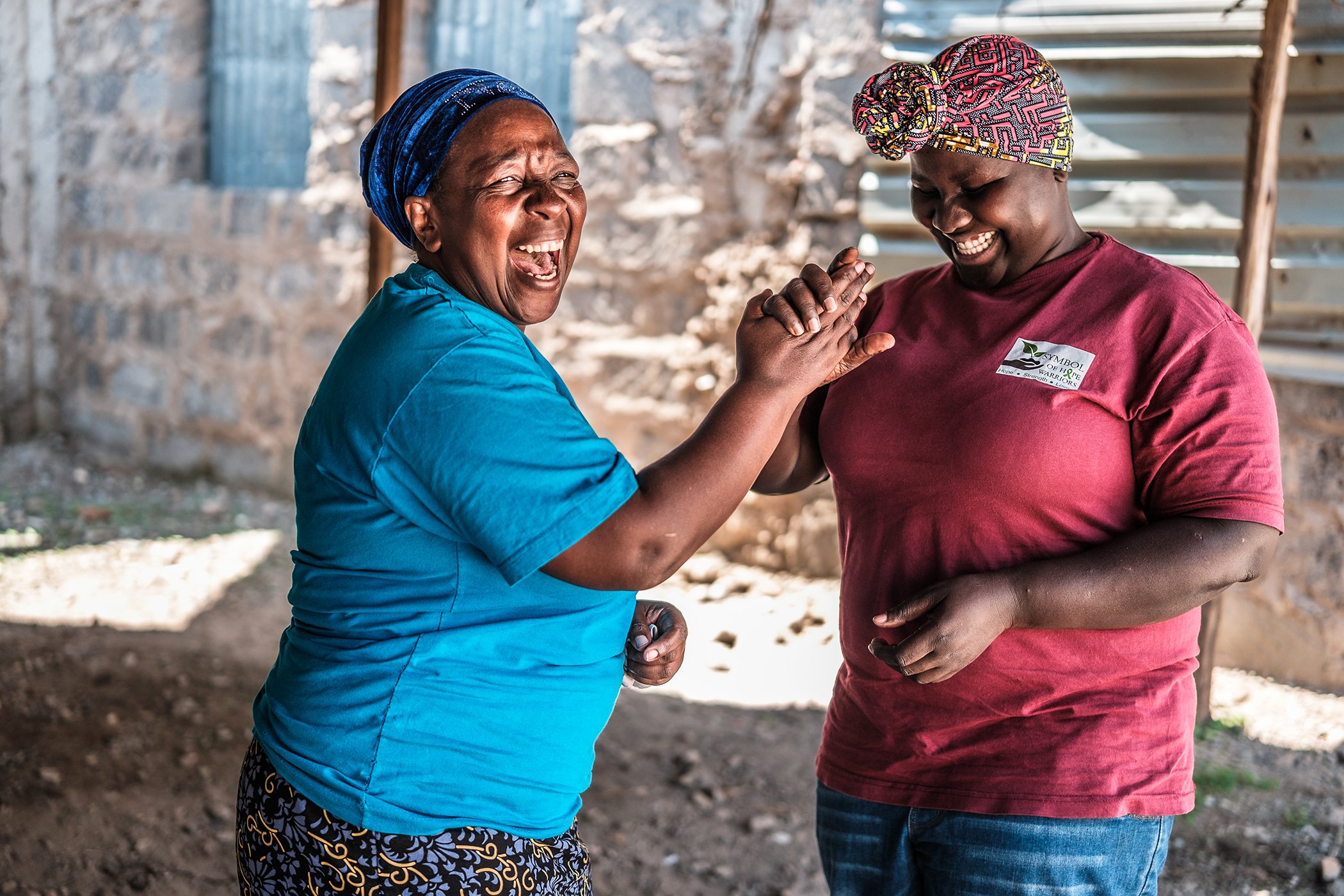 Millicent Kagonga (right) and Monica Njeri (left) are photographed in the Kariobangi area of Nairobi, Kenya in October 2024.