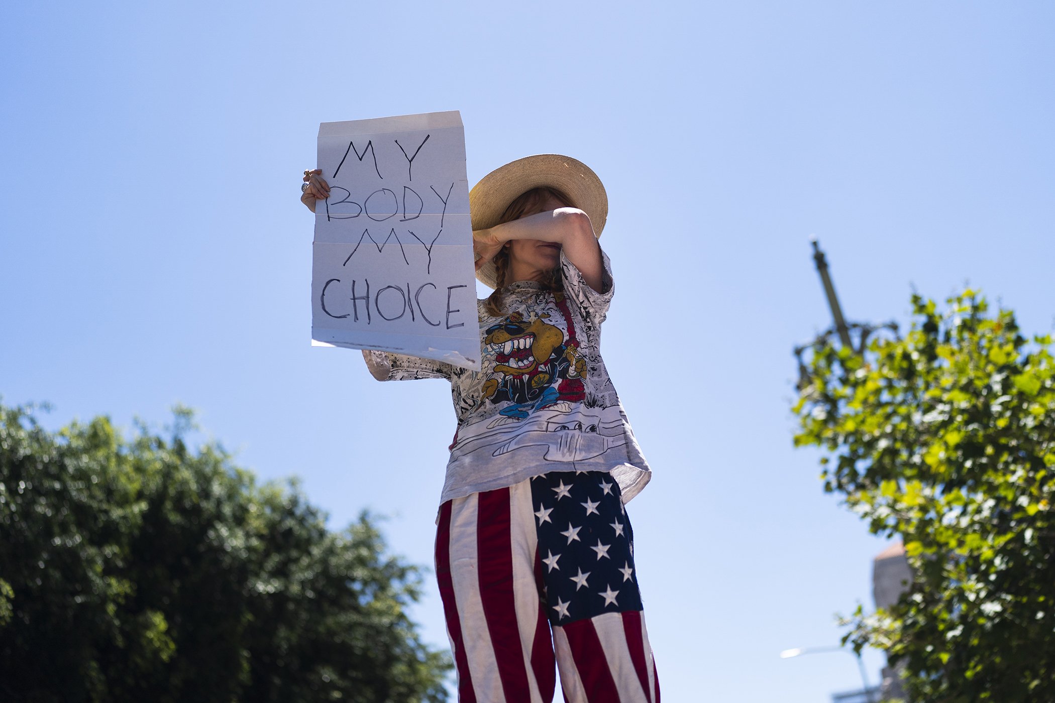 Abortion-rights advocate Eleanor Wells, 34, wipes her tears during a protest in Los Angeles, June 24, 2022.