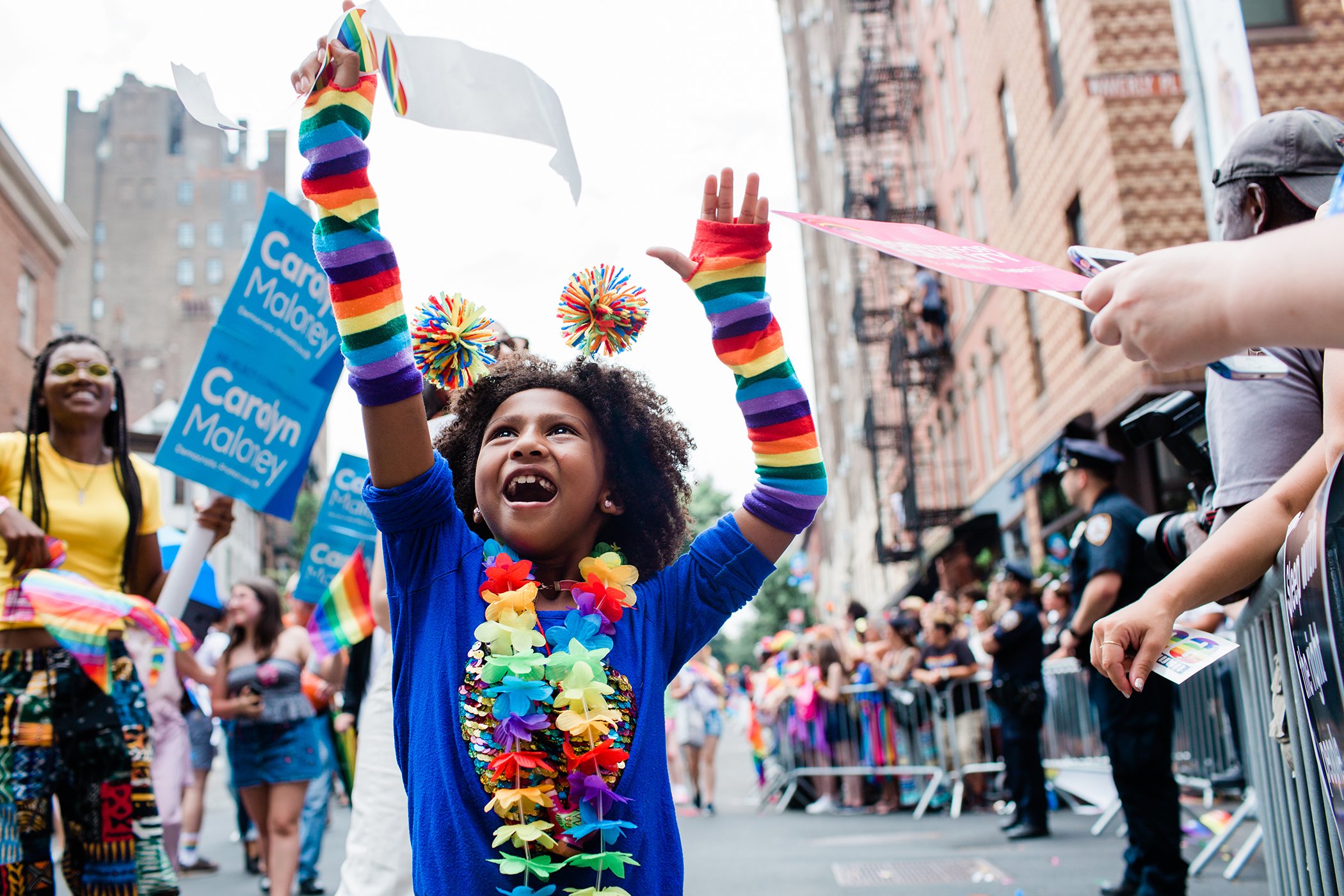 A little girl cheers as she marches through the 2018 NYC Pride March on June 24, 2018.