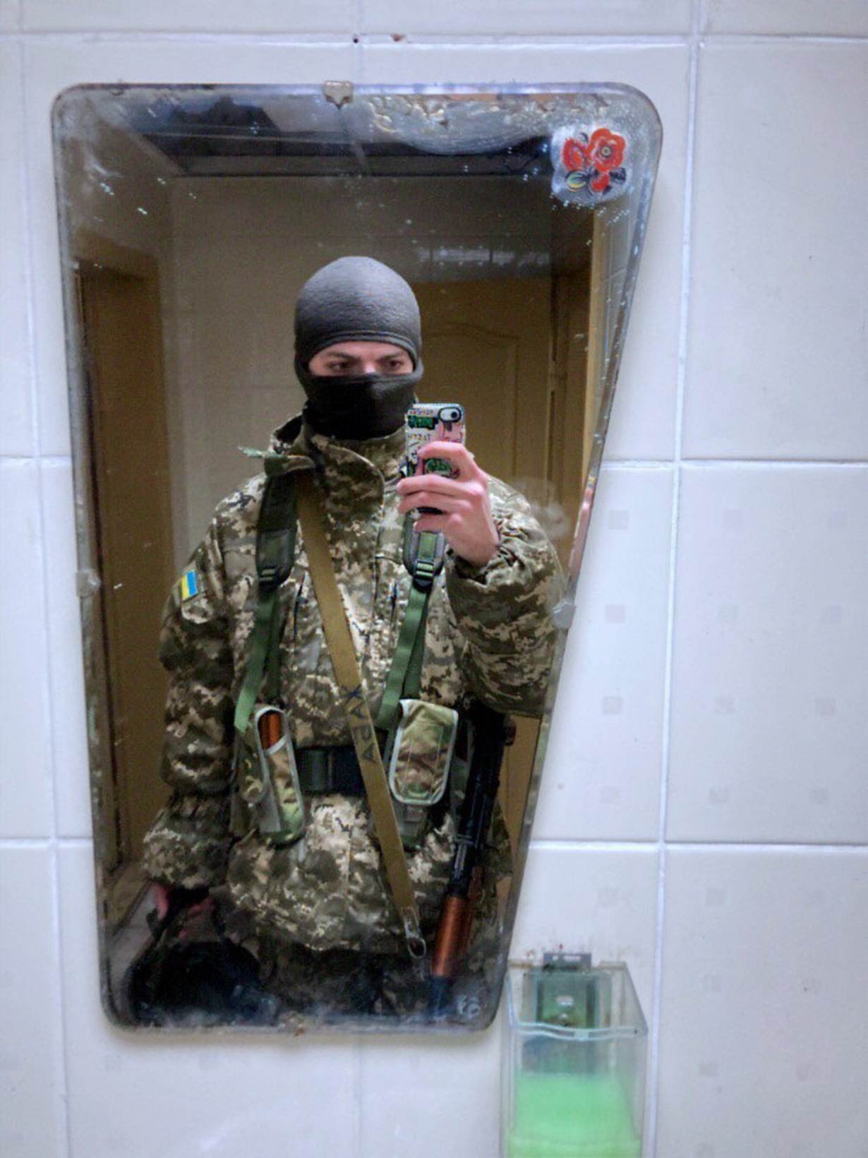 Oleg, a 22-year-old bisexual Ukrainian from Kyiv, took up arms to defend his homeland three days after Russia invaded Ukraine.