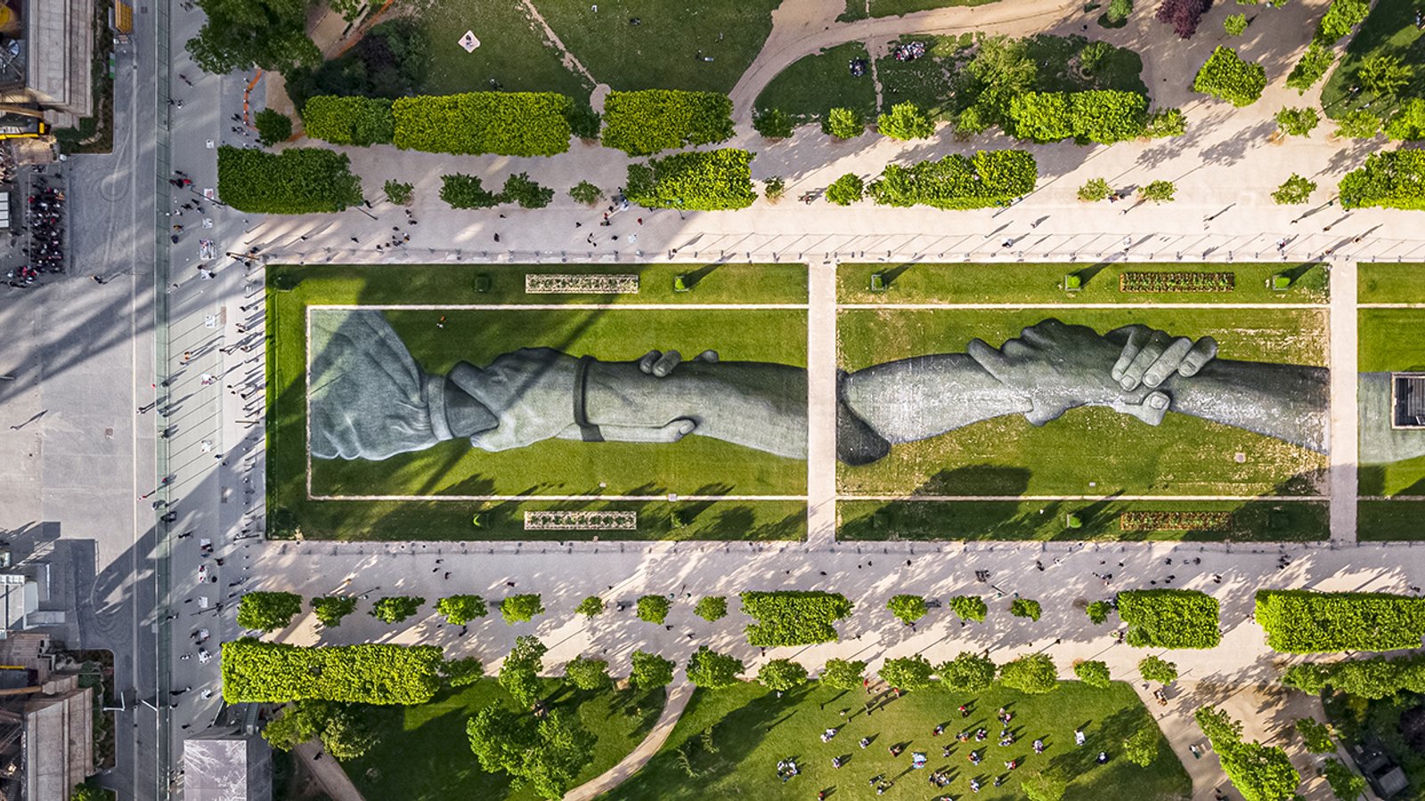 Painting Below the Eiffel Tower is a Tribute to Migrant Rescuers
