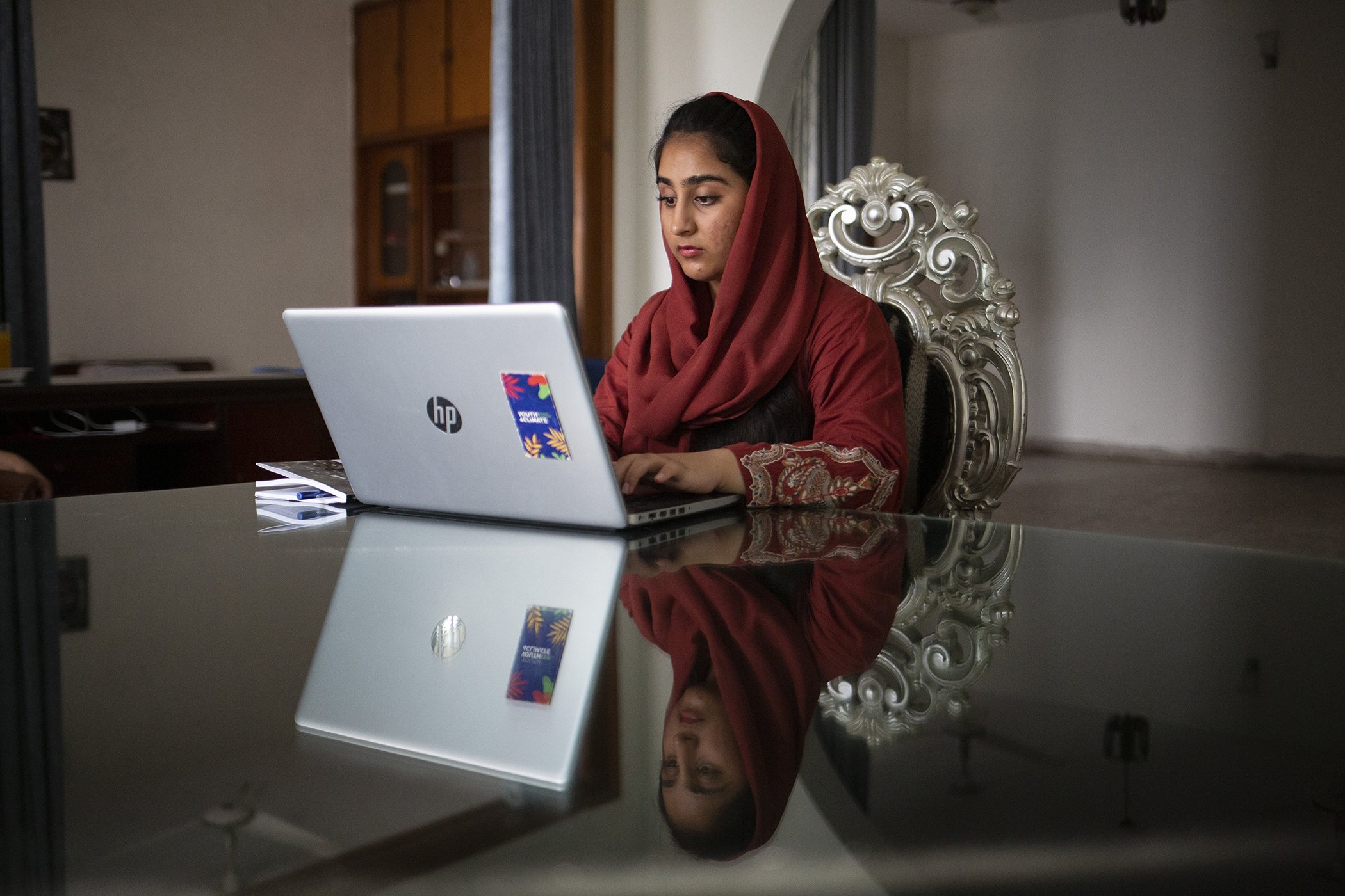 Zainab Waheed works on an upcoming article at her home on June 27, 2023 in Islamabad, Pakistan.