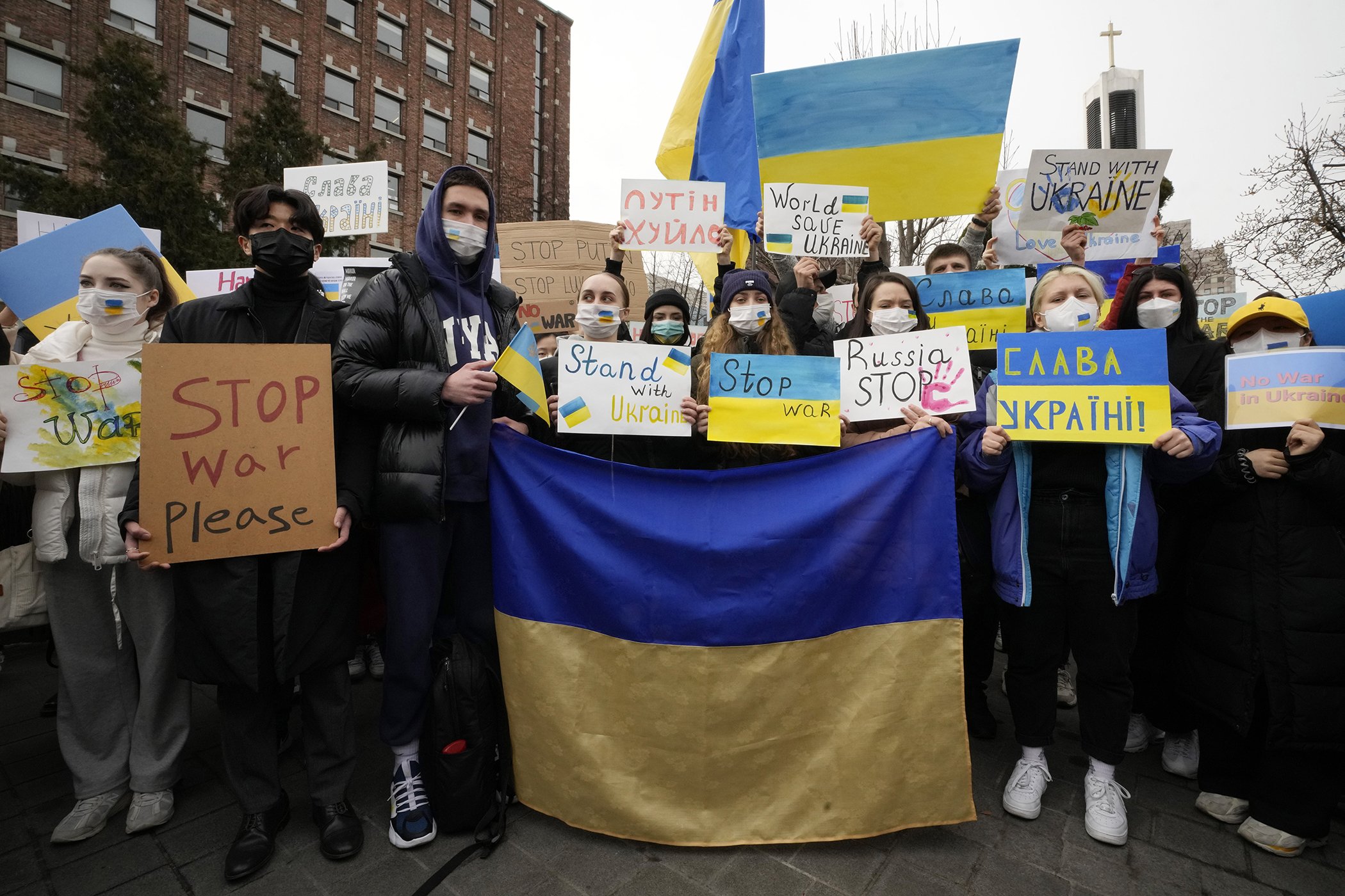 Protesters stage a rally against Russia's invasion of Ukraine, near the Russian Embassy in Seoul, South Korea, Feb. 28, 2022.