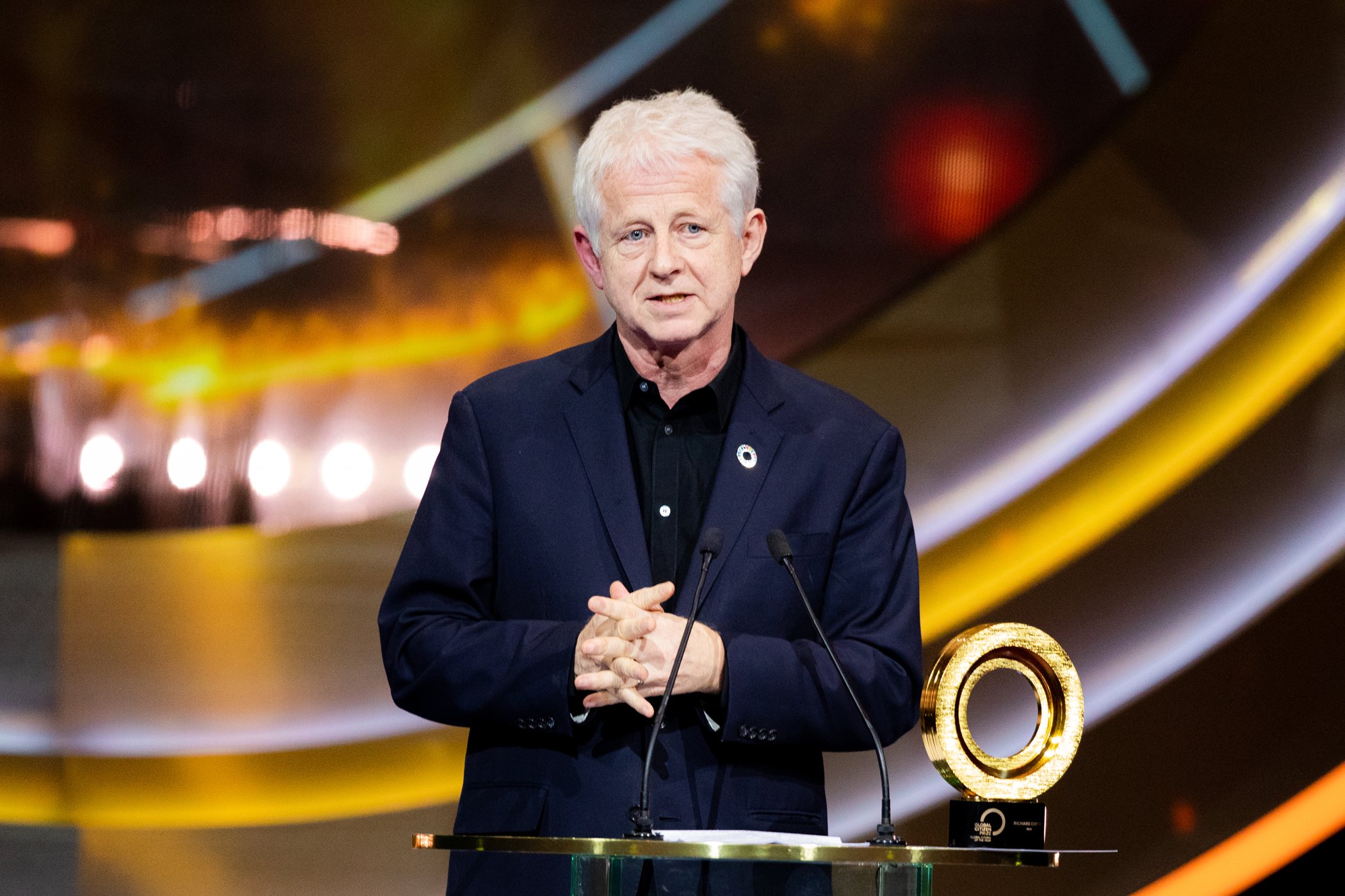 Richard Curtis accepts the Global Citizen of the Year Prize at the Global Citizen Prize at the Royal Albert Hall on Dec. 13, 2019 in London, England.