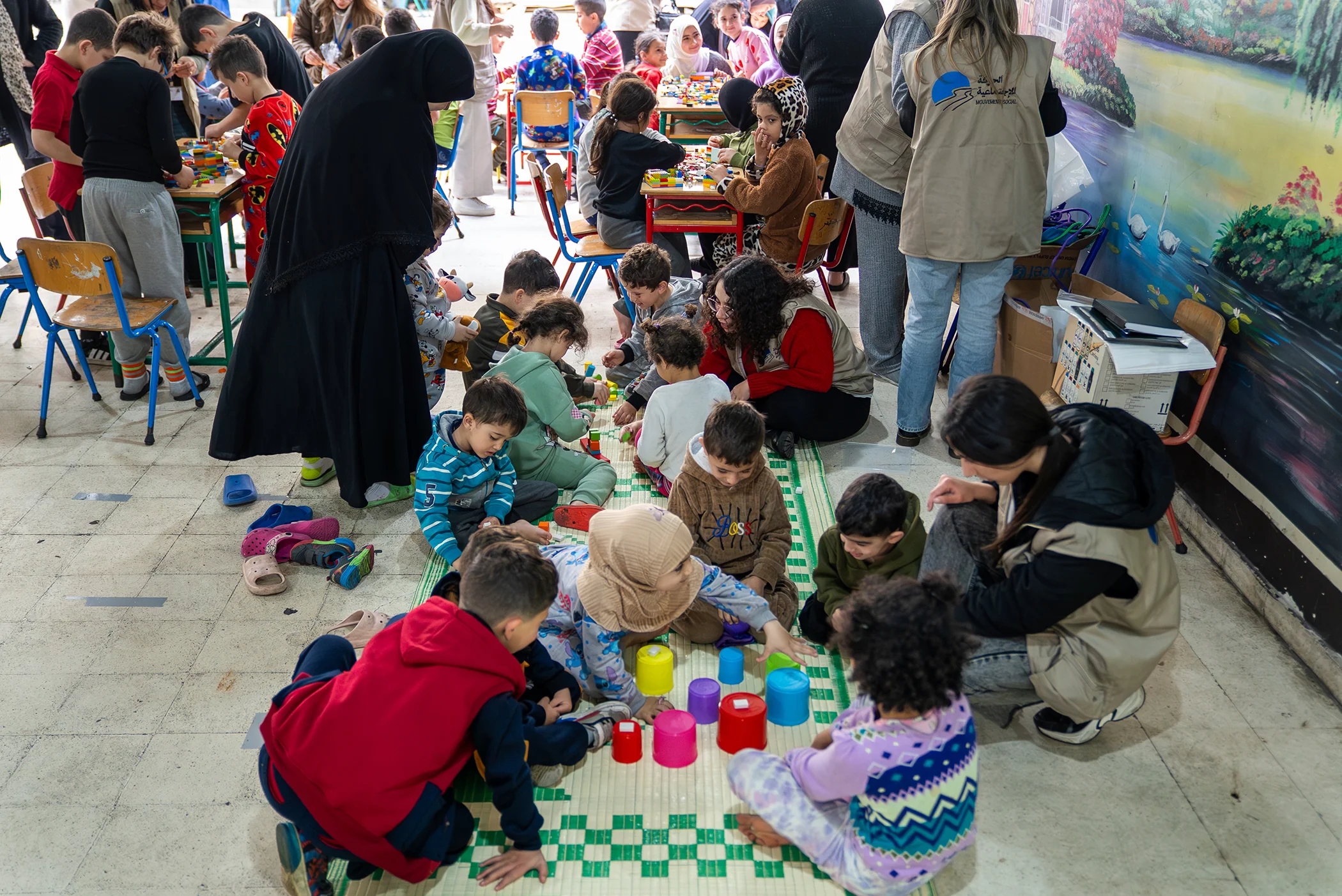 At a public school shelter in Beirut, children displaced by conflict take part in learning, recreational, and psychosocial activities supported by ECW, UNICEF, and local partners.