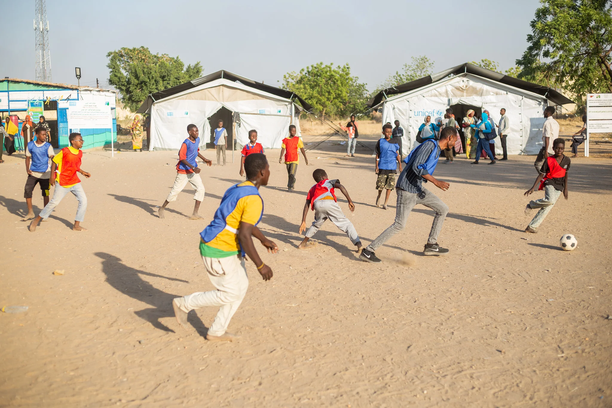 Children play soccer at the UNICEF-supported Makana at El Gox gathering point located in Kosti, White Nile state.