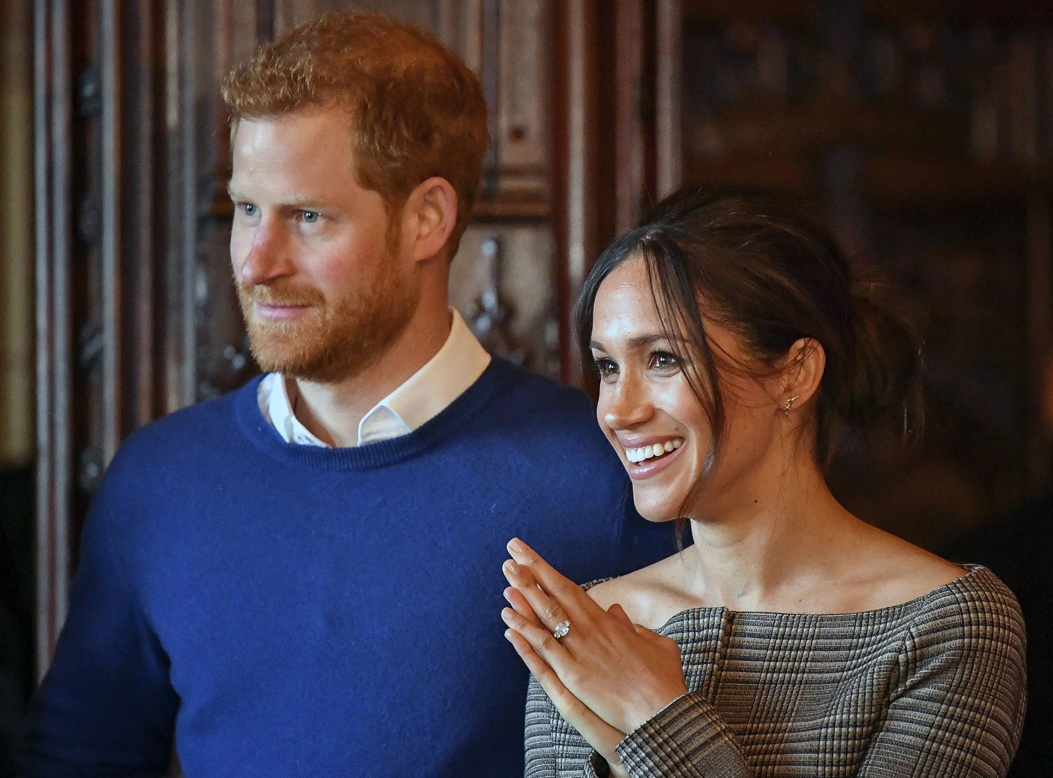 Britain's Prince Harry and Meghan Markle watch a performance by a Welsh choir Cardiff Castle in Cardiff, Wales, Jan. 18, 2018.