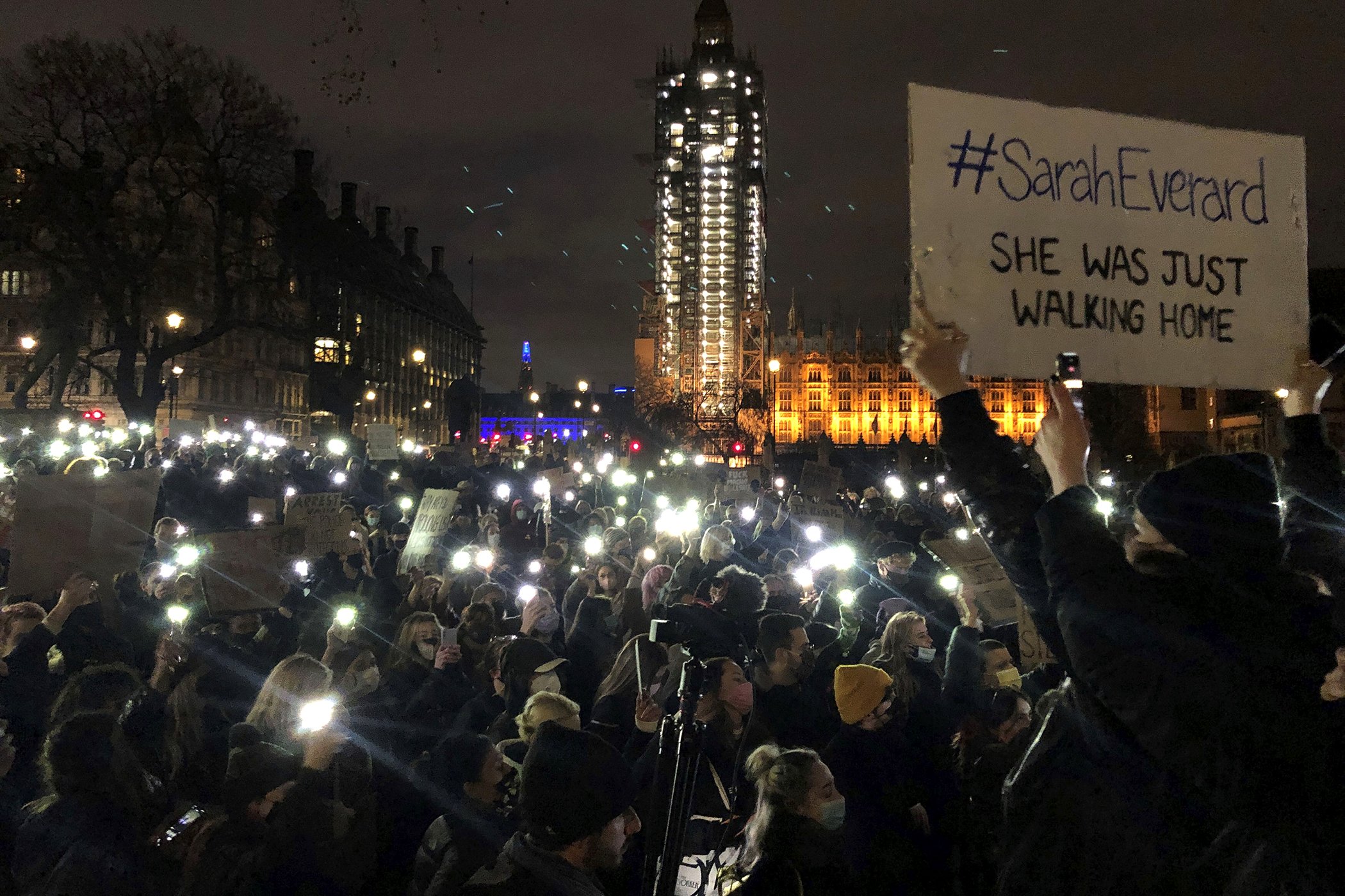 People gather in Parliament Square, London, on March 14, 2021 in honor of Sarah Everard. Everard disappeared while walking home from a friend’s apartment and was found dead a week later.