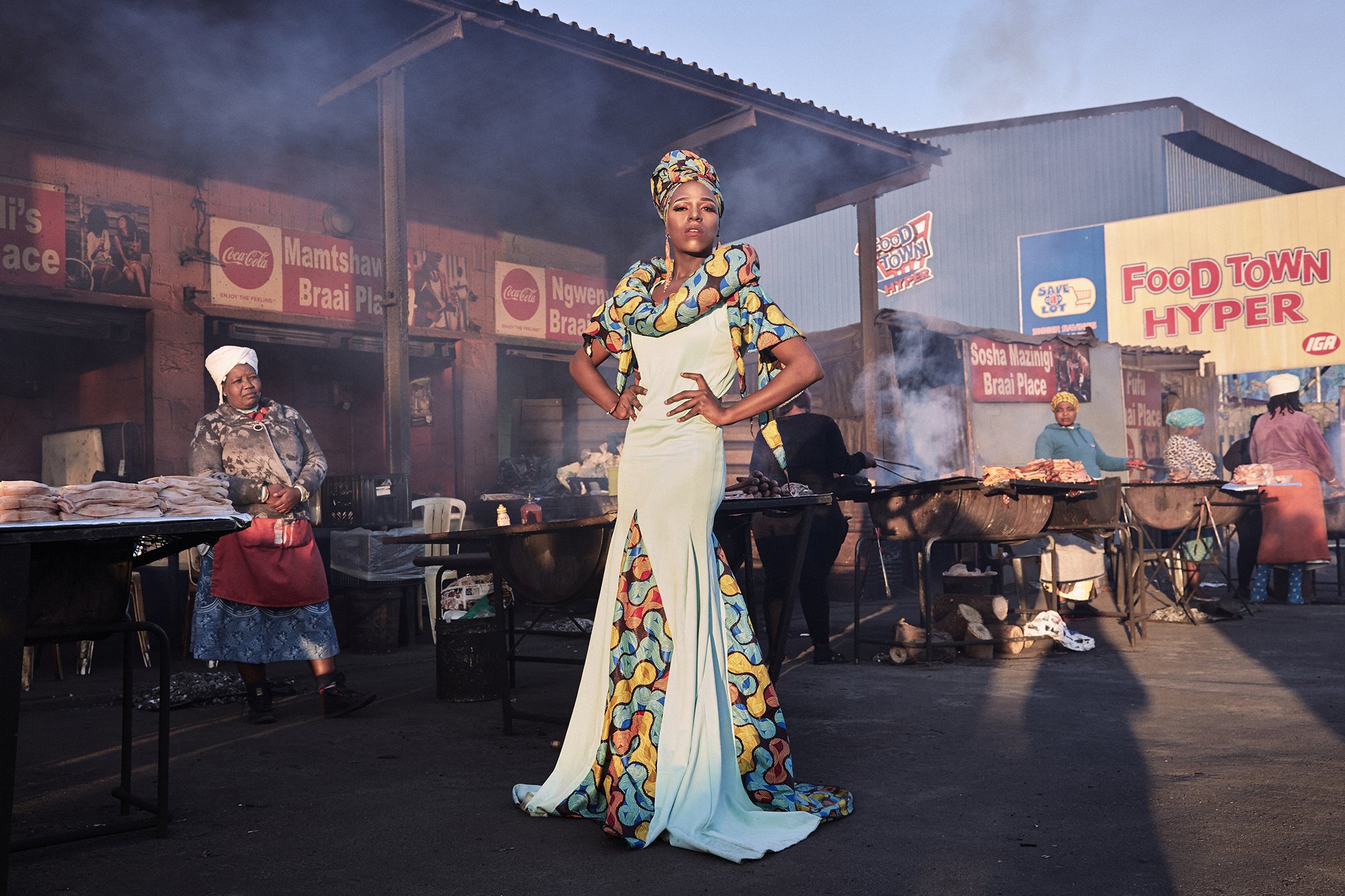 Black Drag Magic - Portrait of a Drag Artist & Activist: Belinda Qaqamba Ka-Fassie at a shisanyama, a community space where women cook and sell meat, in Khayelitsha, a township near Cape Town, South Africa. Nominated in the portrait singles category.