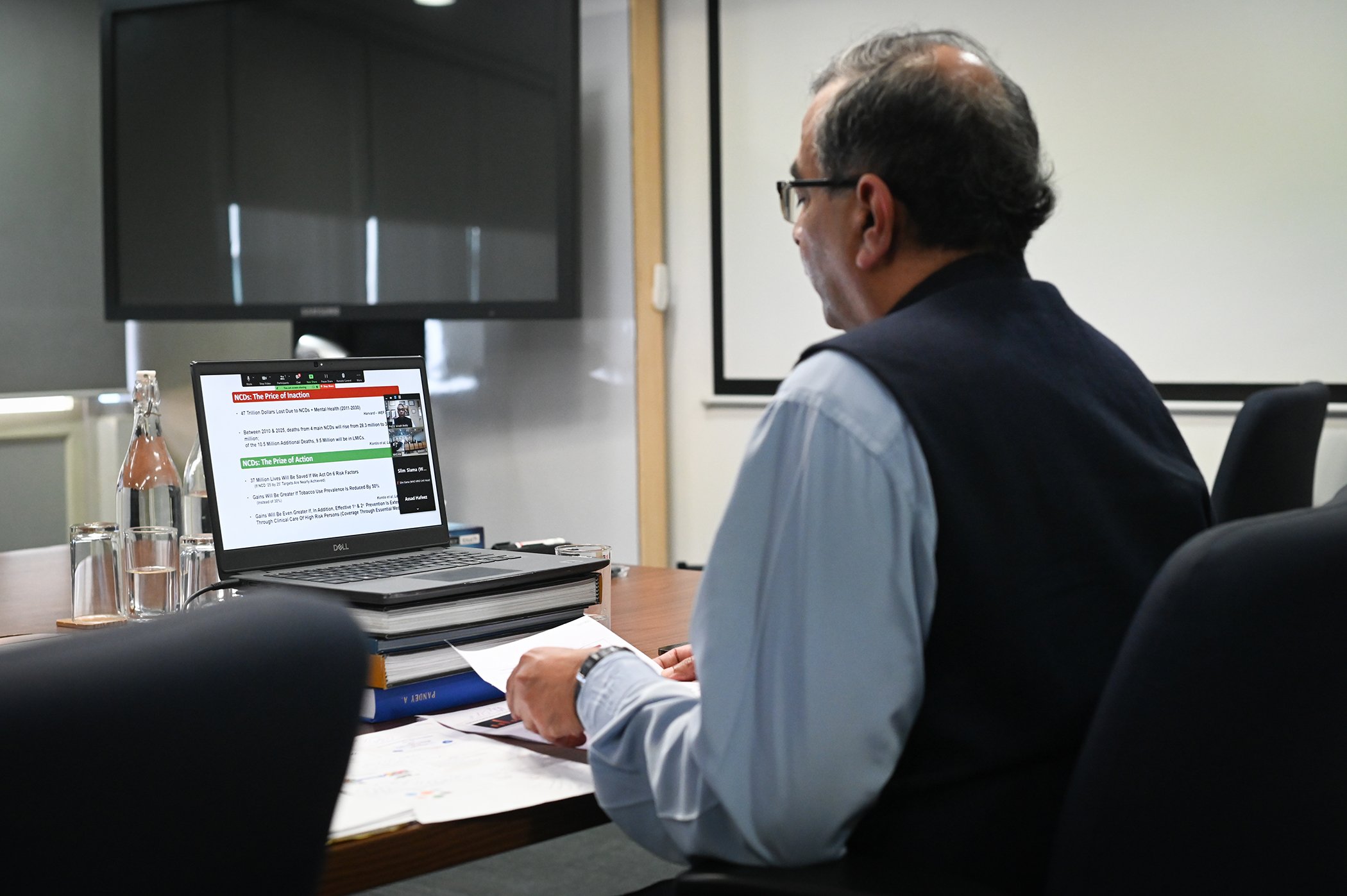 Professor K. Srinath Reddy, President works on his computer as he prepars to deliver a keynote lecture for a webinar at the Health Leadership for Positive Change Program.