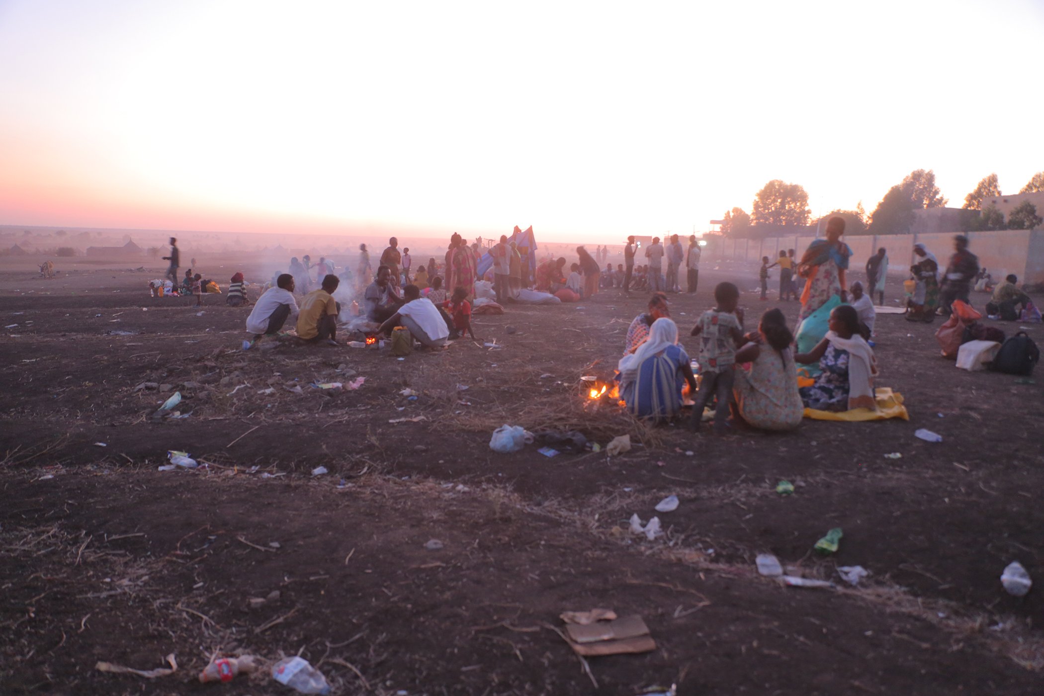 Ethiopian refugees are pictured near UNHCR's Hamdayet border reception in Sudan. A worsening crisis is unravelling in northern Ethiopia, where clashes between the Ethiopian army and forces from the Tigray region are driving thousands of people to flee.