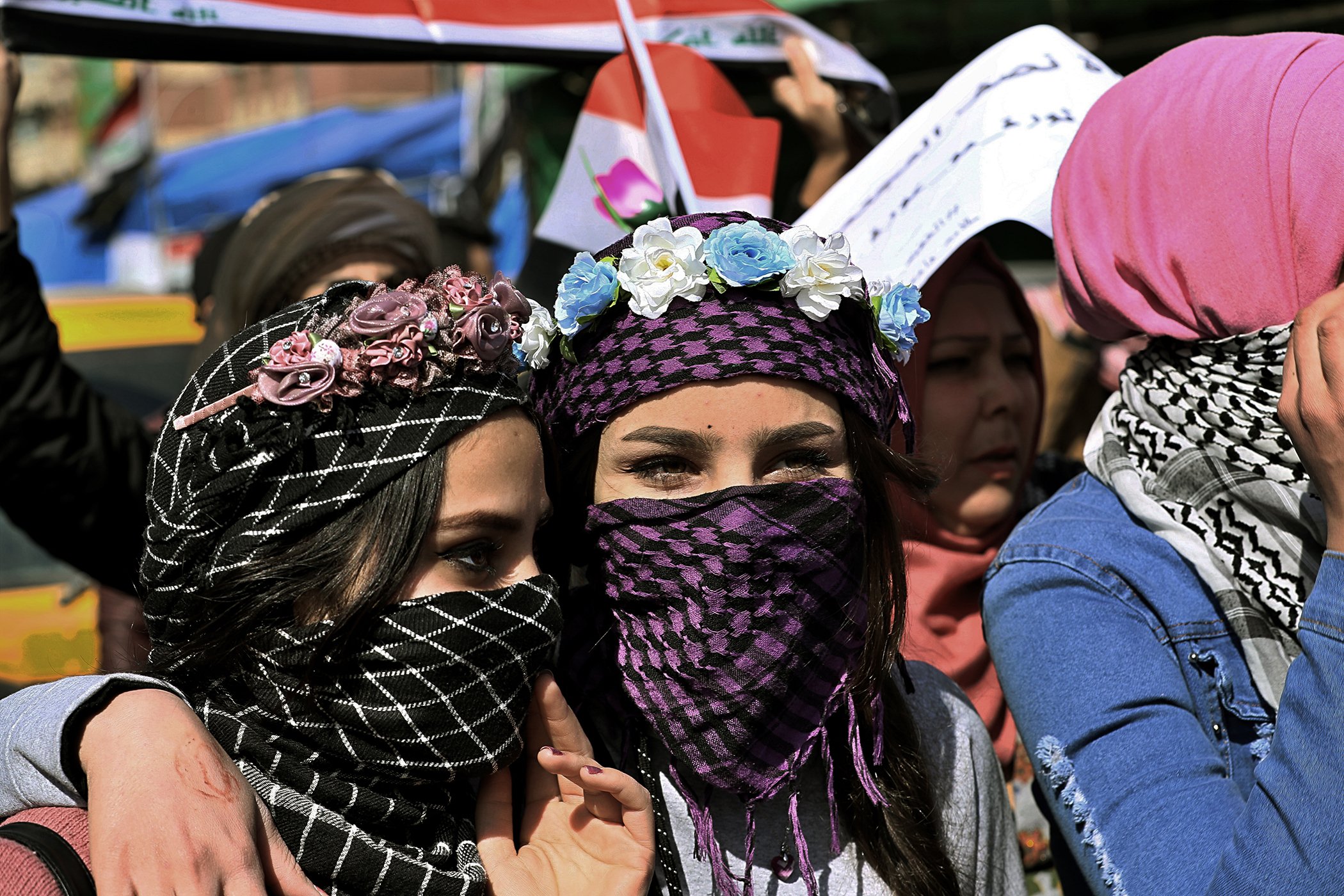 Women take part in a protest in Tahrir Square, Baghdad, Iraq, Feb. 13, 2020.