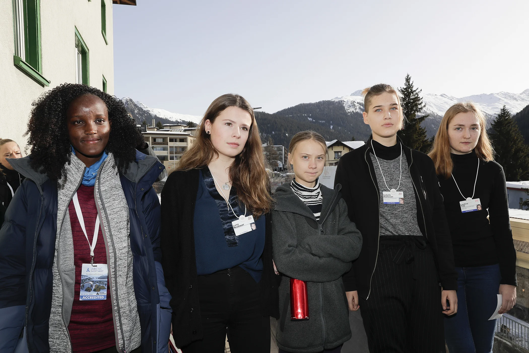 Climate activists Vanessa Nakate, Luisa Neubauer, Greta Thunberg, Isabelle Axelsson and Loukina Tille, from left, arrive for a news conference in Davos, Switzerland, Friday, Jan. 24, 2020.