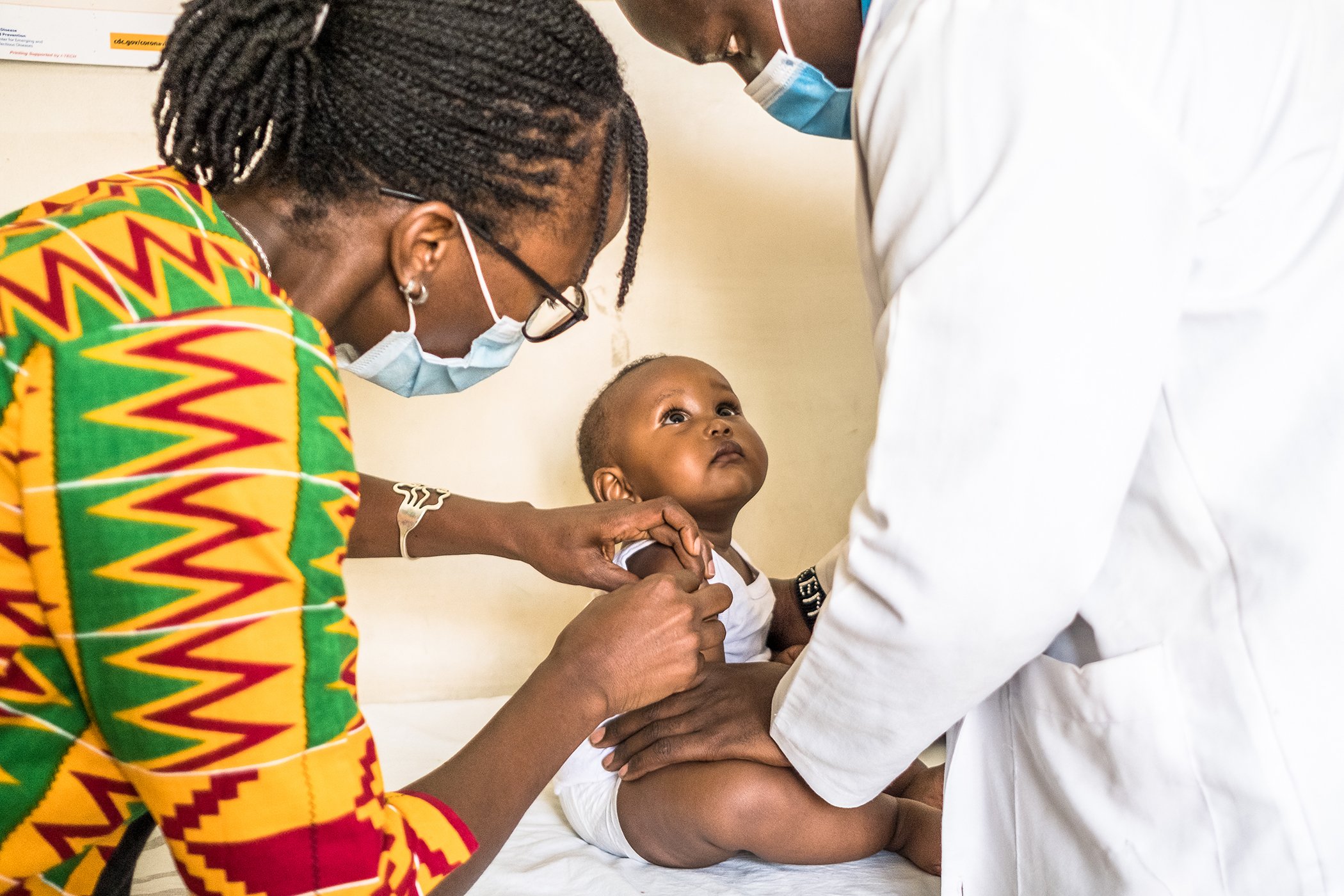 Dr. Rose Jalang'o vaccinates a child at a health facilty in Nairobi, Kenya on Jan. 18, 2021.