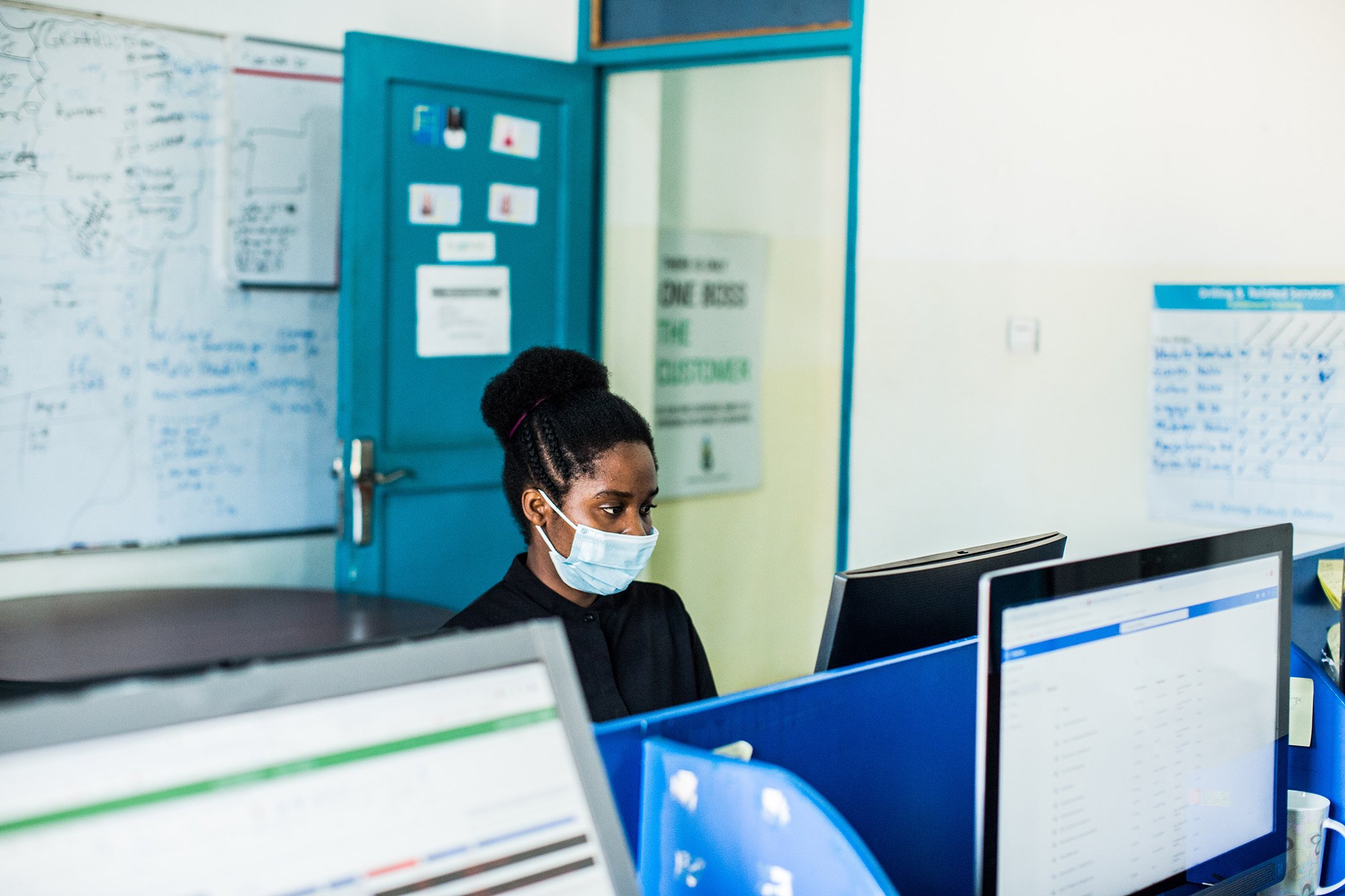 A team member is photographed at the Water Access Rwanda offices in Kigali, Rwanda.