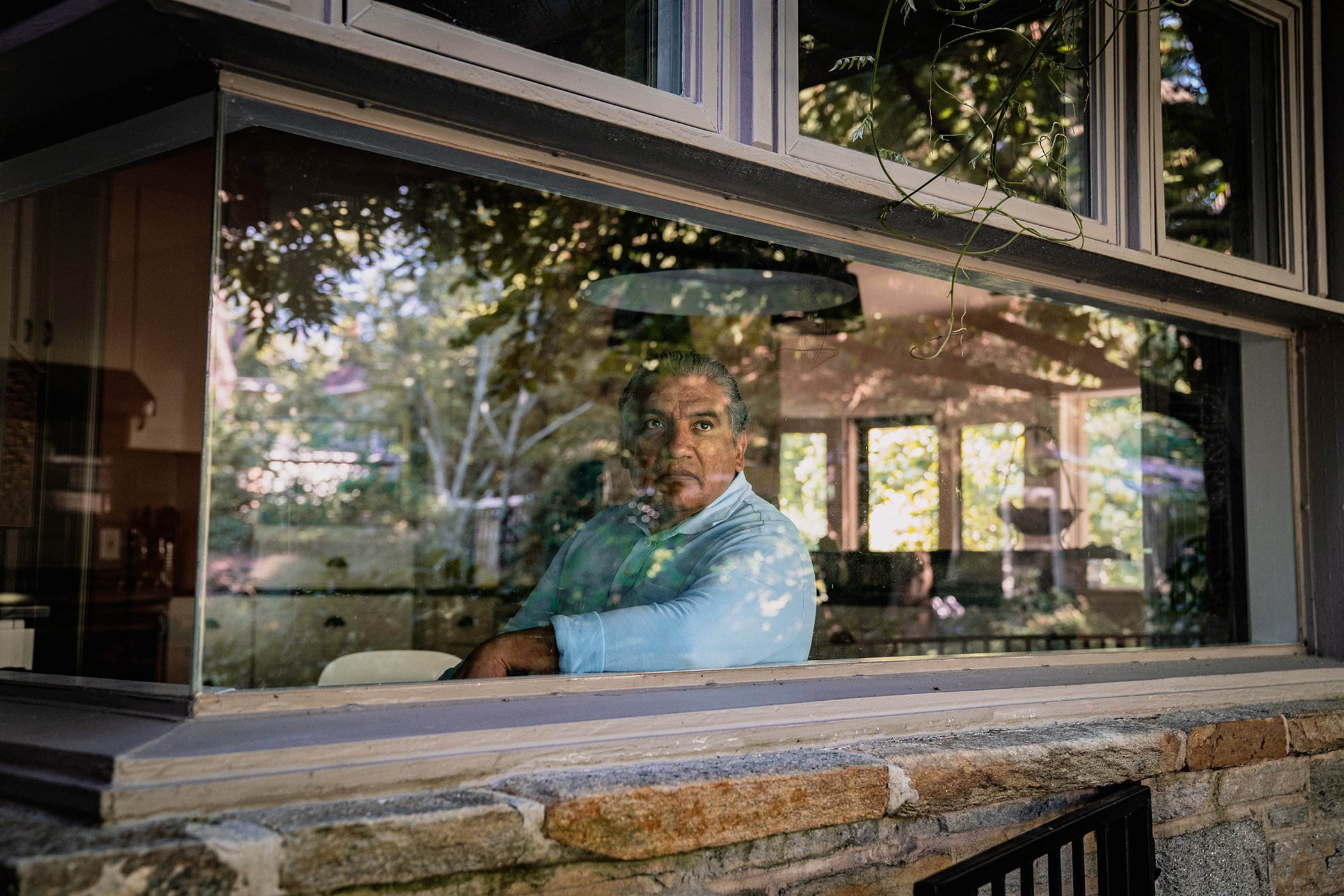 Human rights activist and health care advocate Walter Flores stands for a portrait at his house in Baltimore, MD on Sept. 7, 2021.