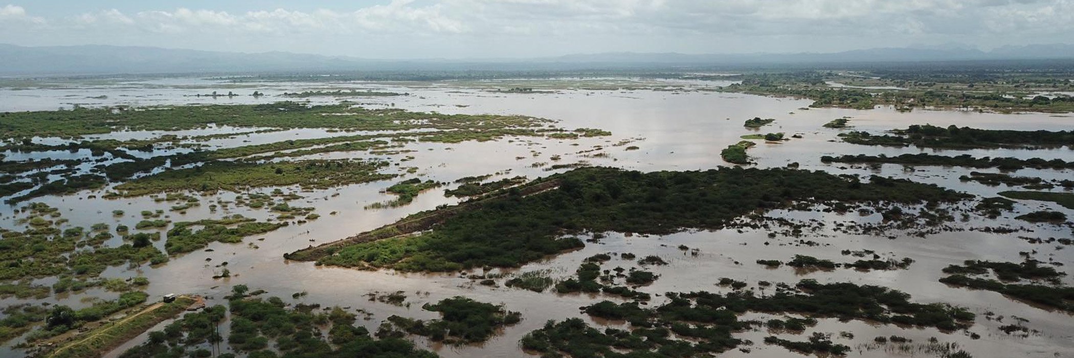This photo issued March 19, 2019, taken within last week, flood waters cover large tracts of land in Nicoadala, Zambezia, Mozambique. Floodwaters have created "an inland ocean," endangering many thousands of families in the aftermath of Cyclone Idai.