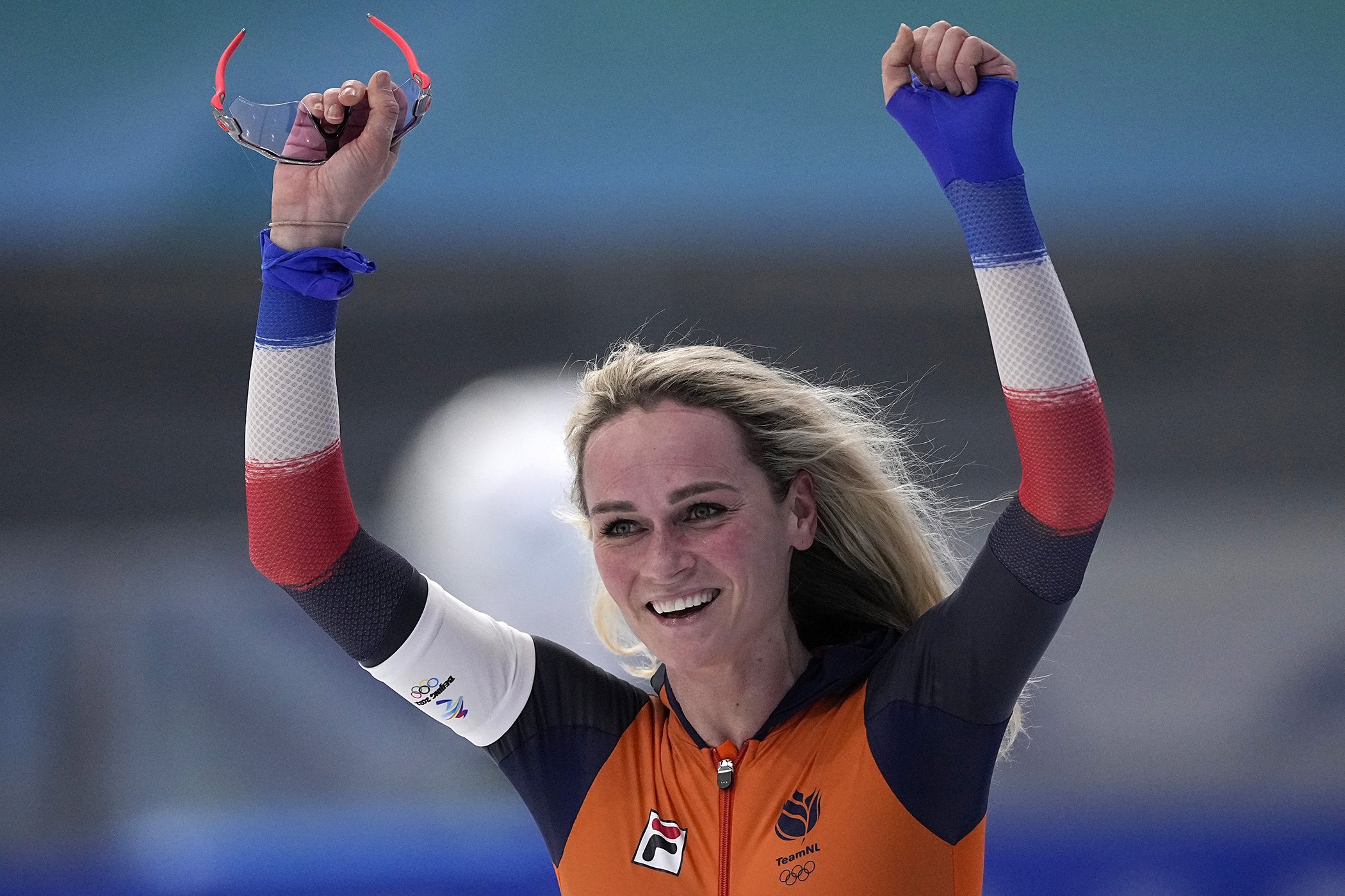 Irene Schouten of the Netherlands reacts after winning the gold medal and setting an Olympic record in the women's speedskating 5,000-meter race at the 2022 Winter Olympics, Feb. 10, 2022, in Beijing.