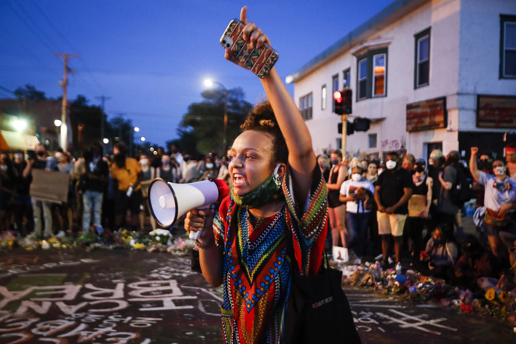 Protesters gather at a memorial for George Floyd where he died outside Cup Foods on East 38th Street and Chicago Avenue, Monday, June 1, 2020, in Minneapolis.